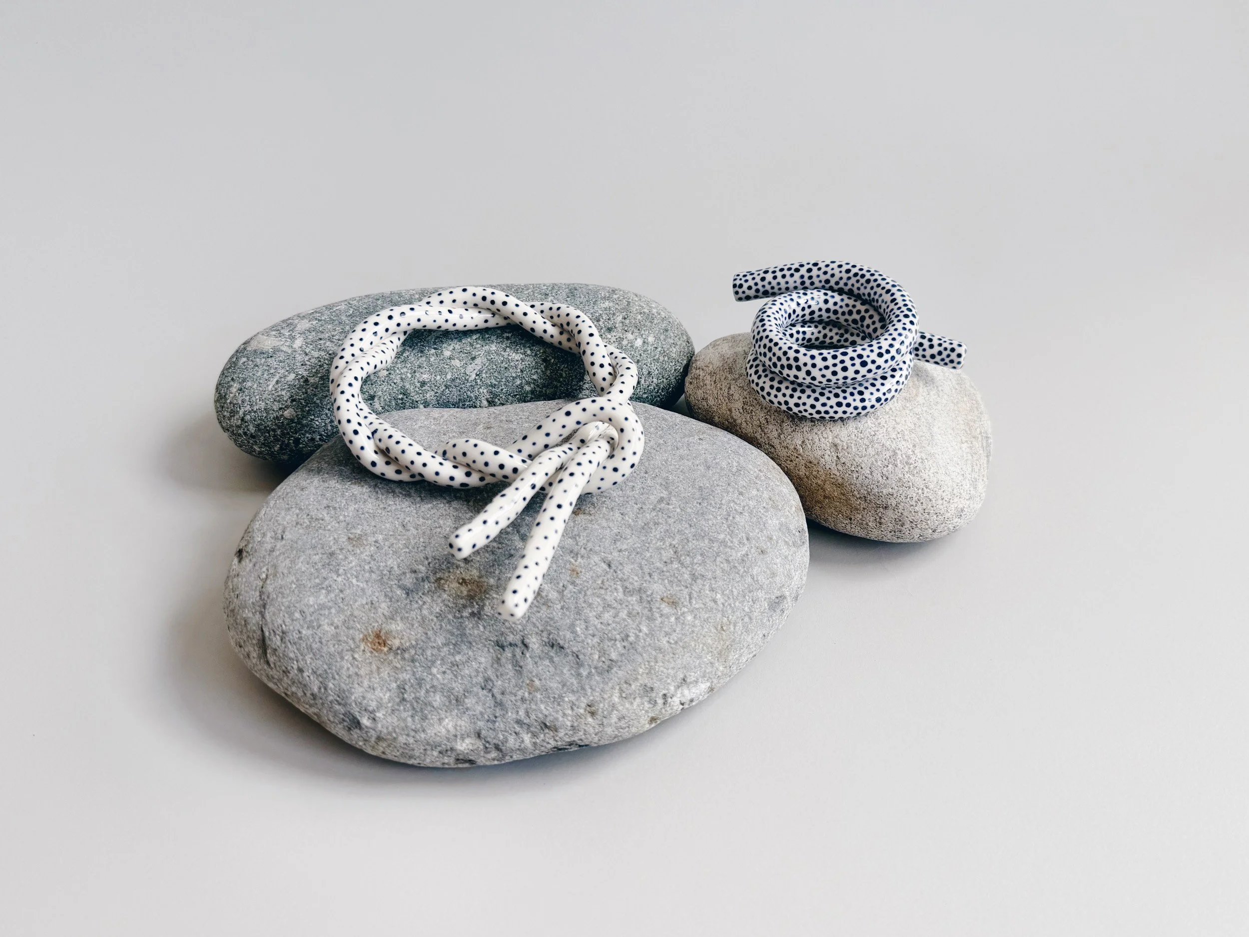 Blue and white, handmade ceramic squiggle