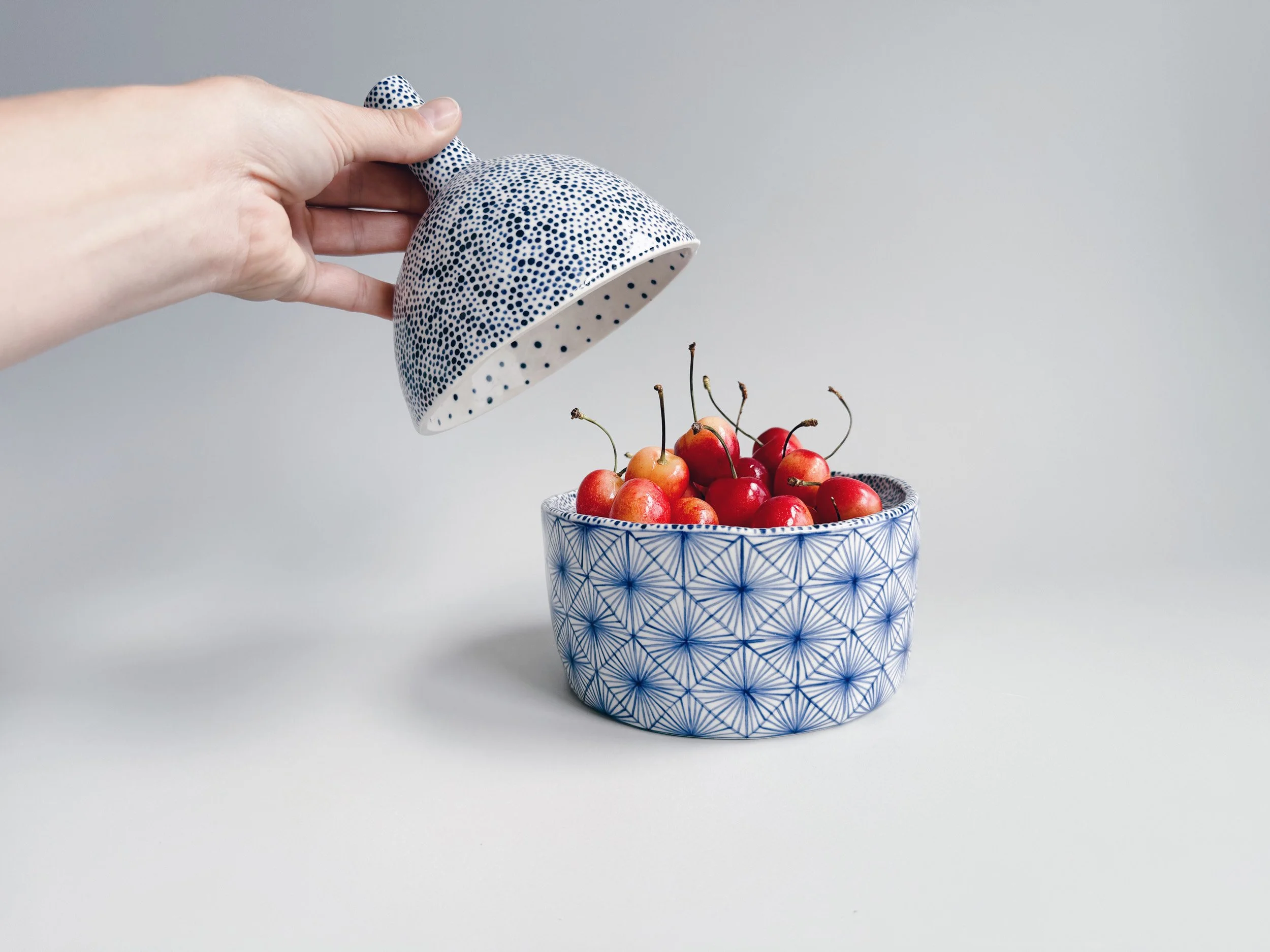 Blue and white, handmade ceramic jar.