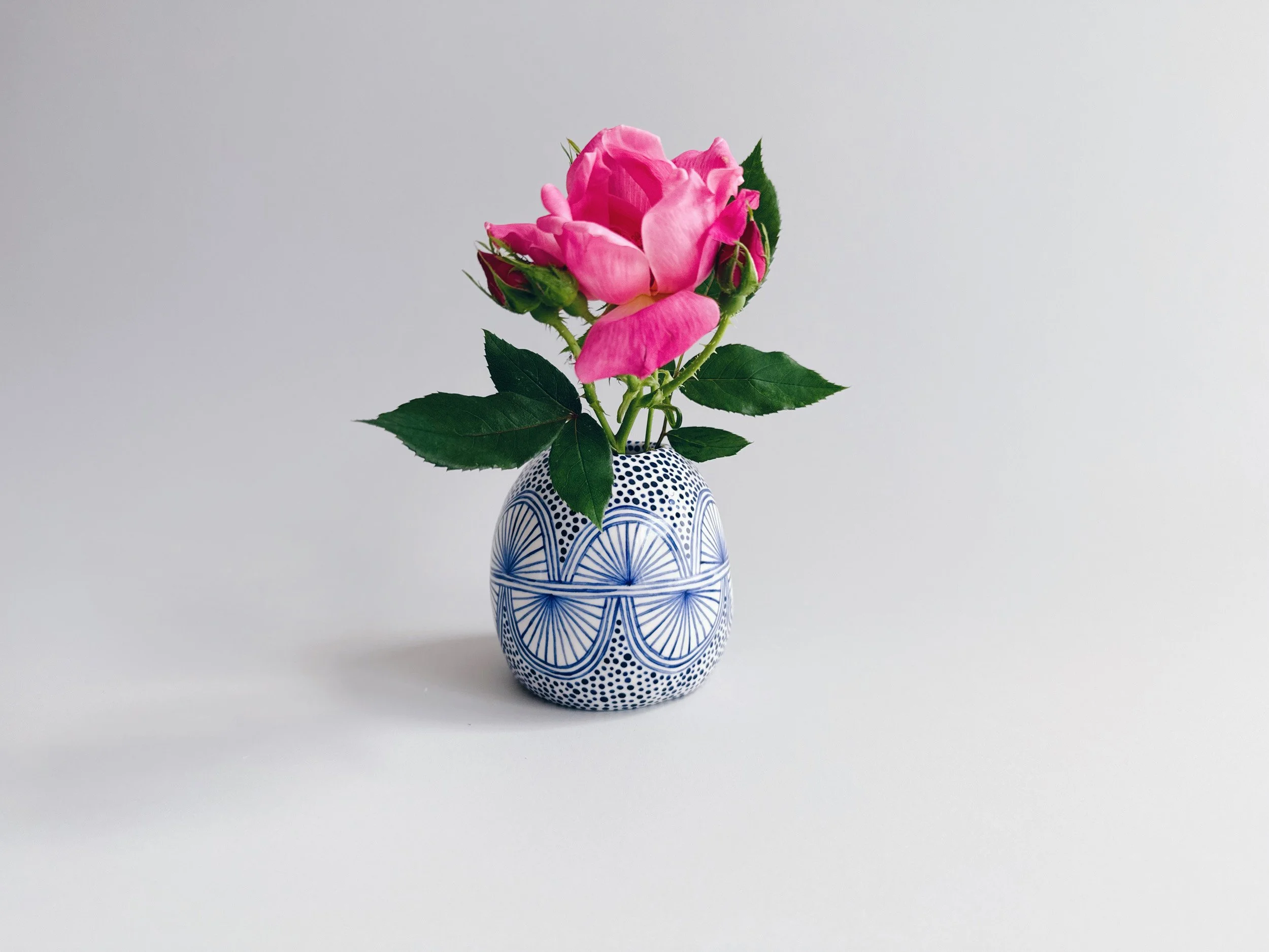 Blue and white, handmade ceramic vase.