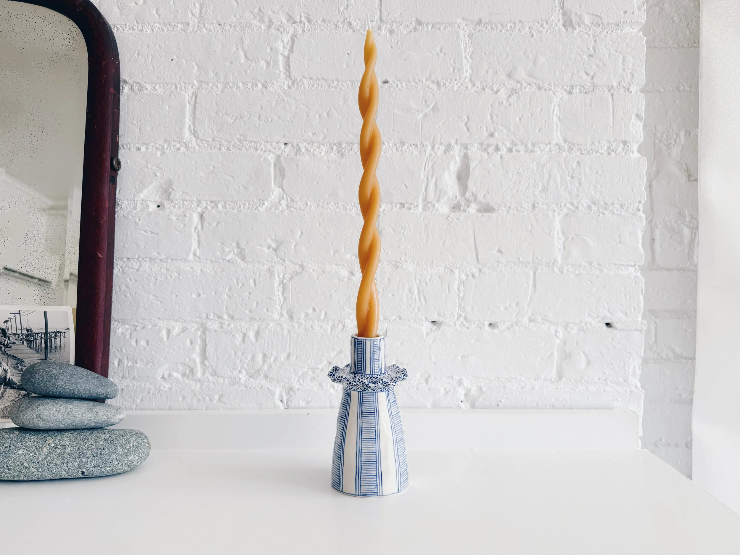 Blue and white, handmade ceramic candleholder.