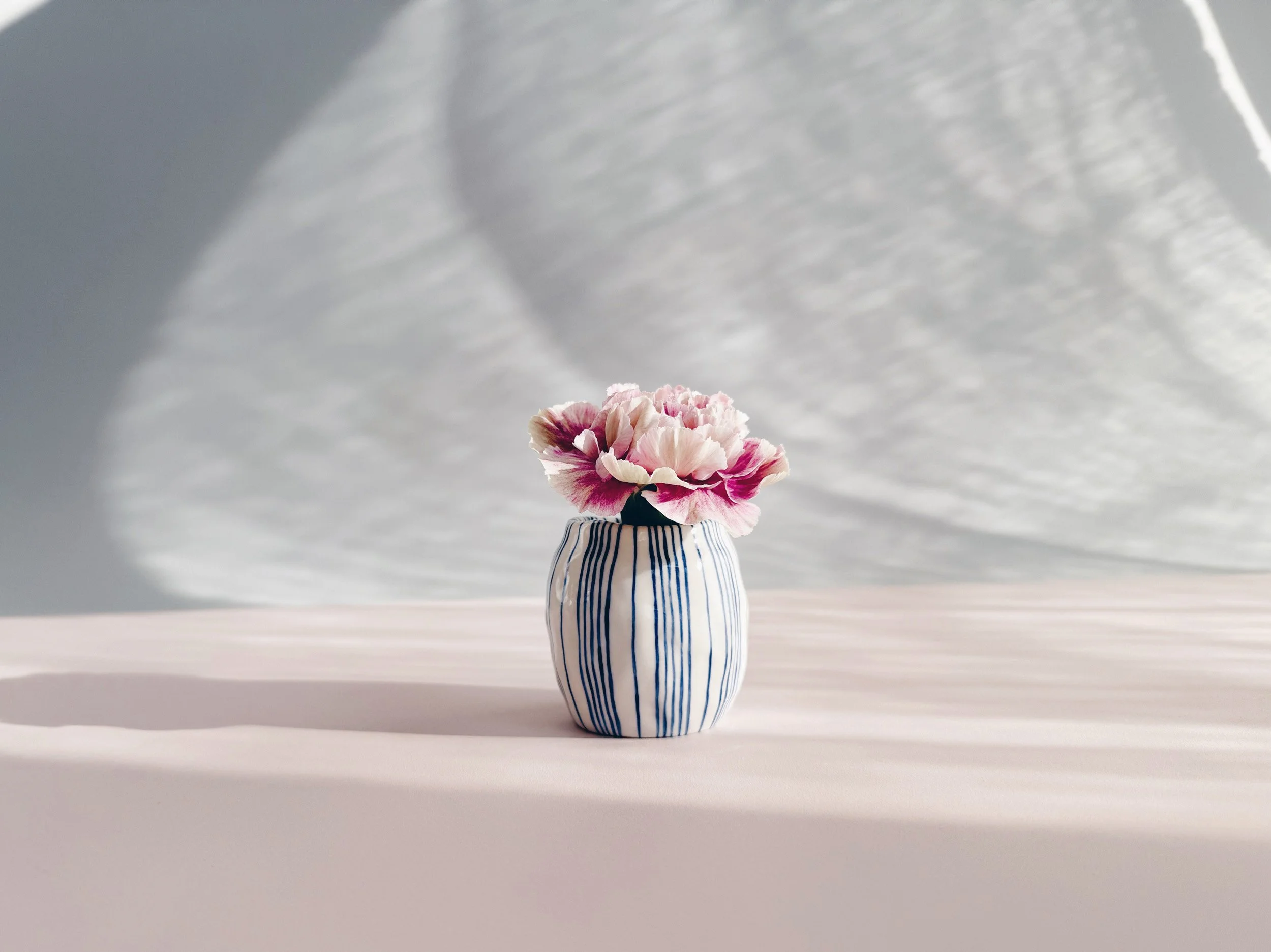 Blue and white, handmade ceramic vase.