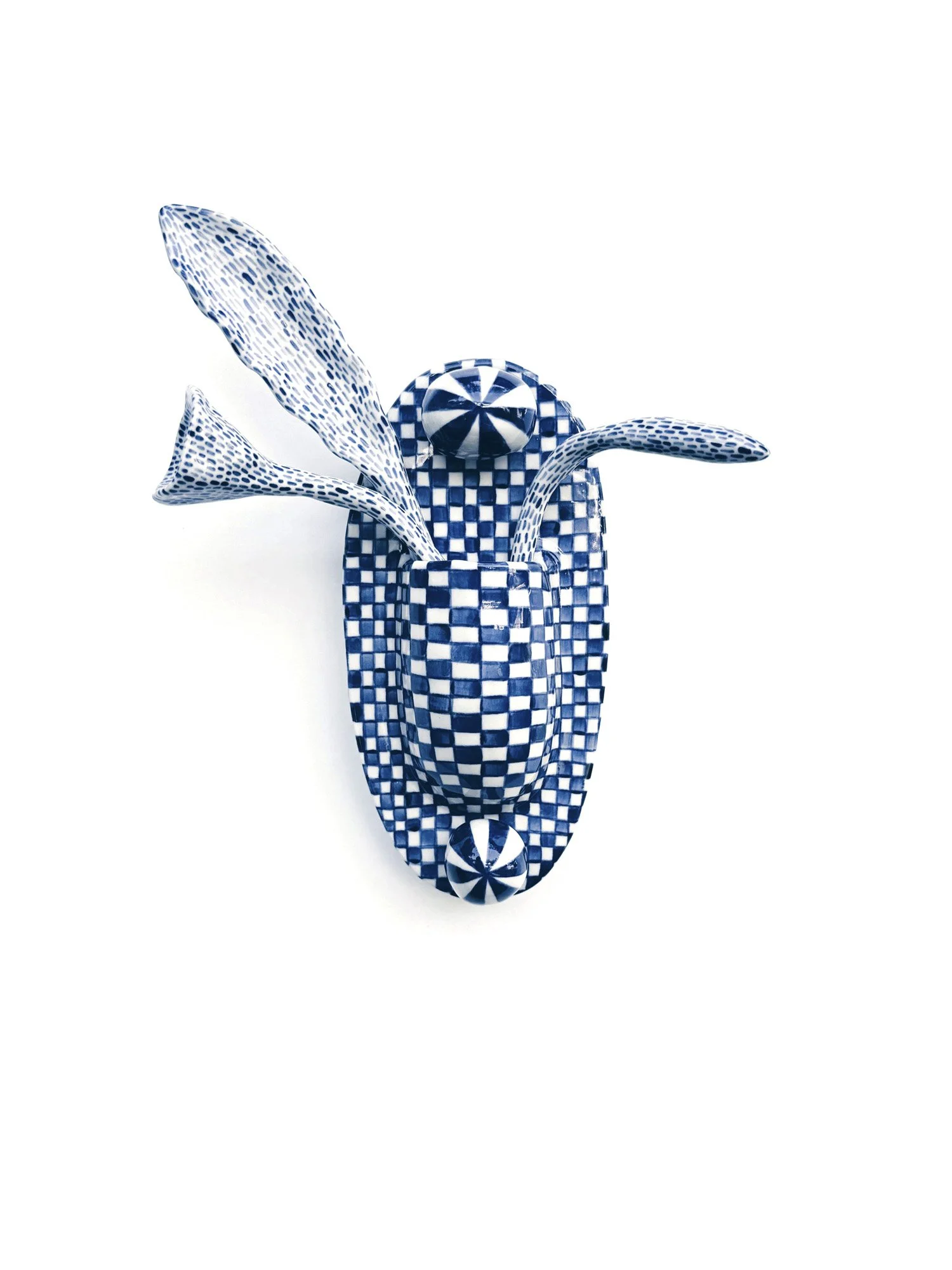 Blue and white, handmade ceramic wall hanging.