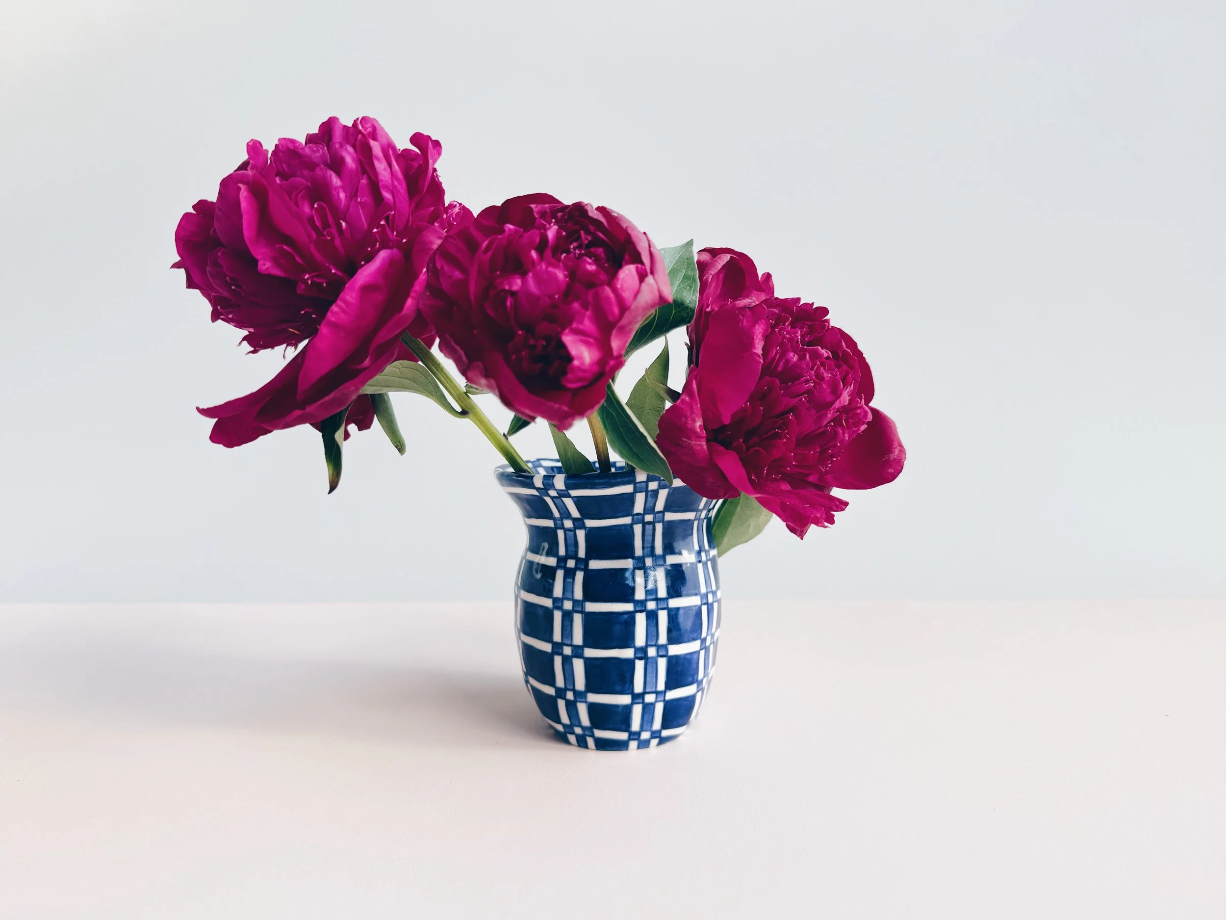 Blue and white, handmade ceramic vase.