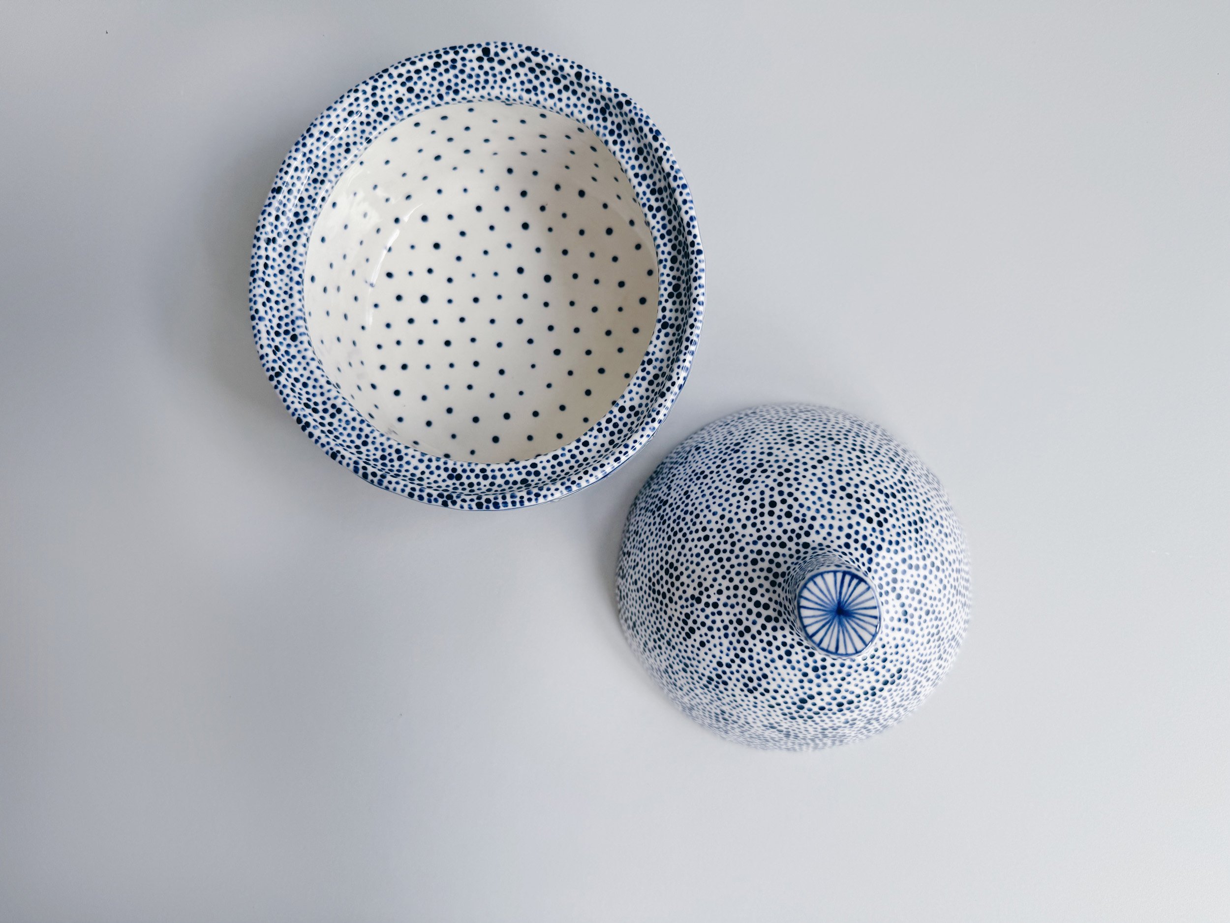 Blue and white, handmade ceramic jar.