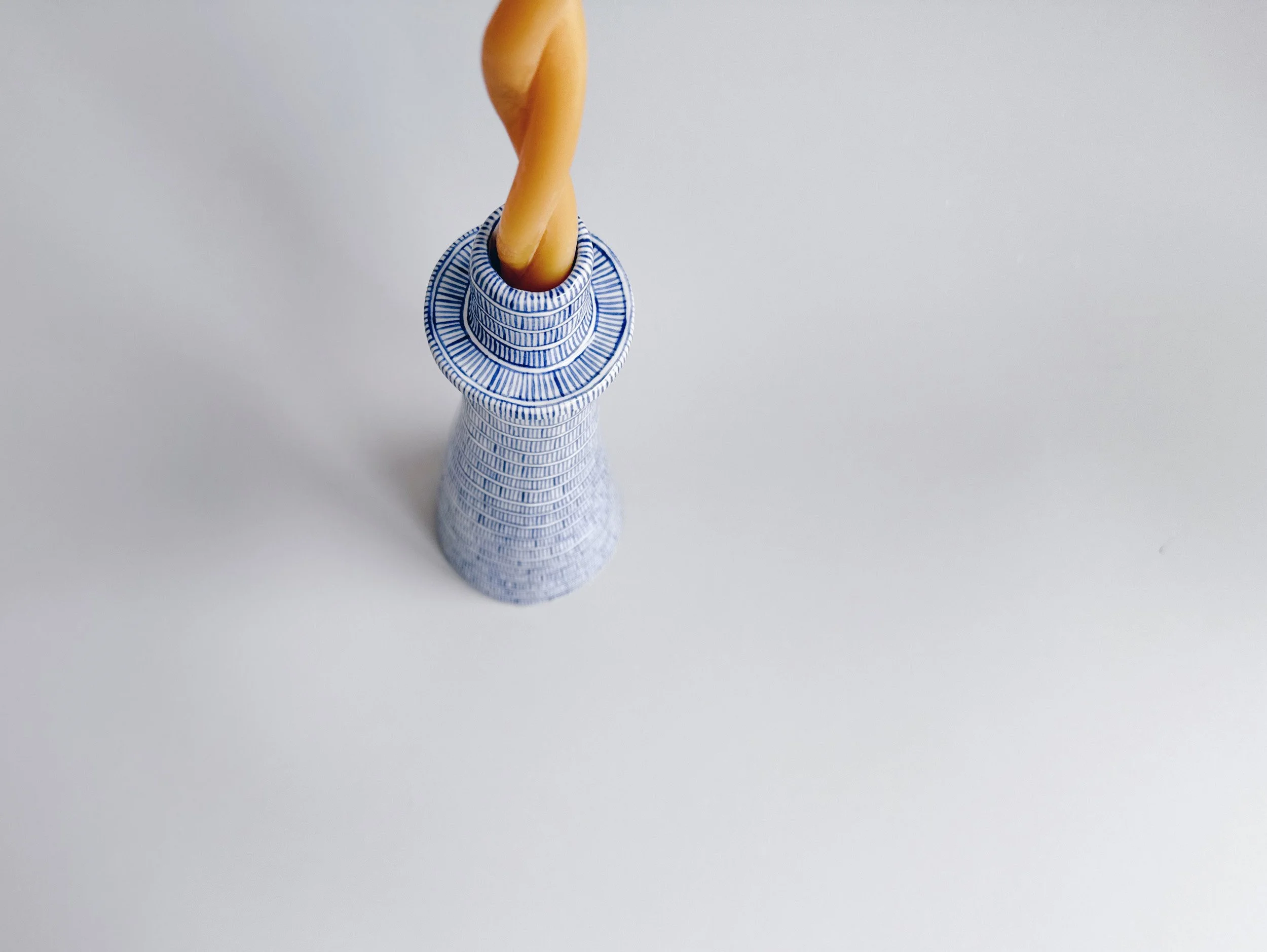 Blue and white, handmade ceramic candleholder.