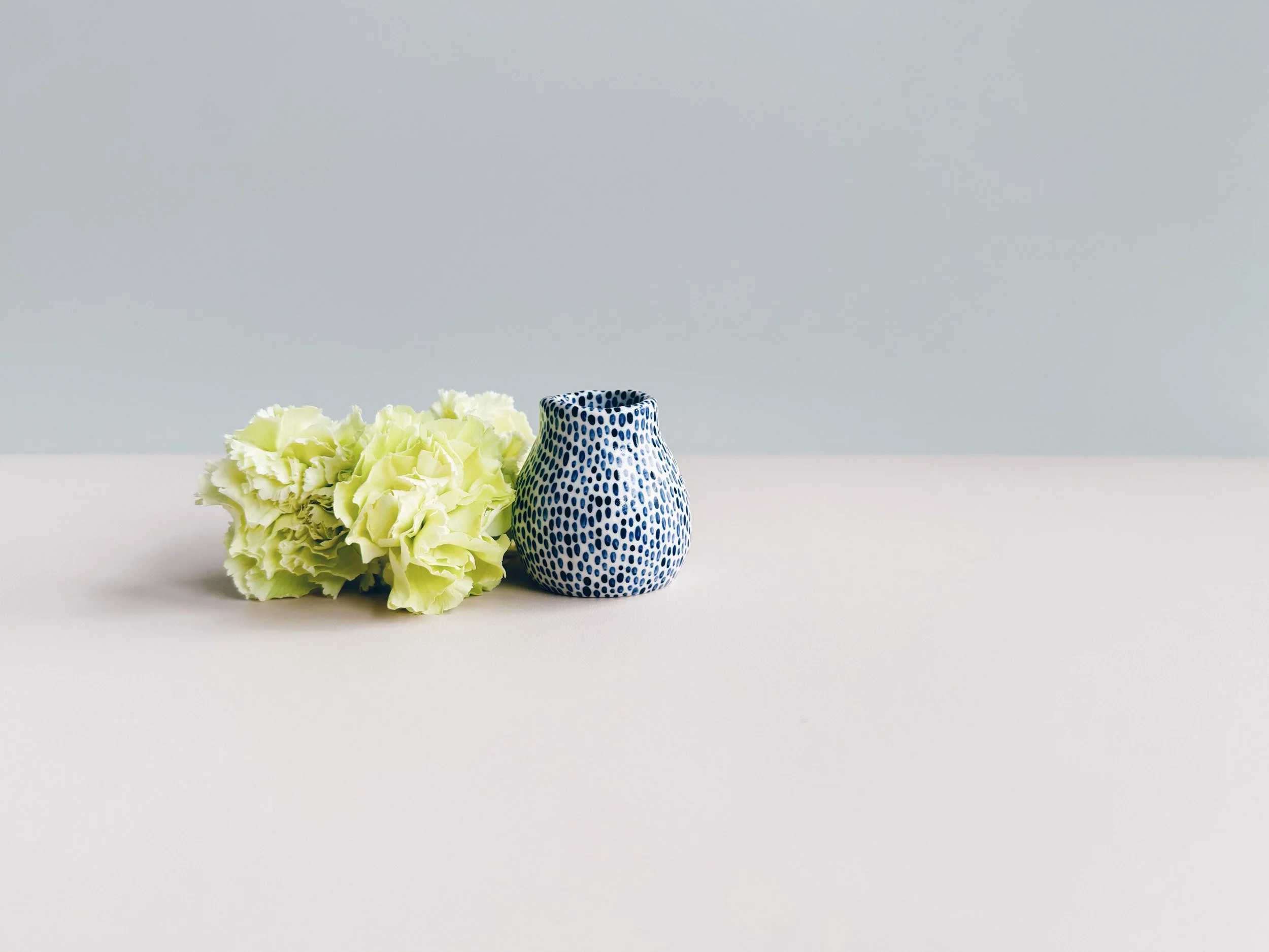 Blue and white, handmade ceramic vase.