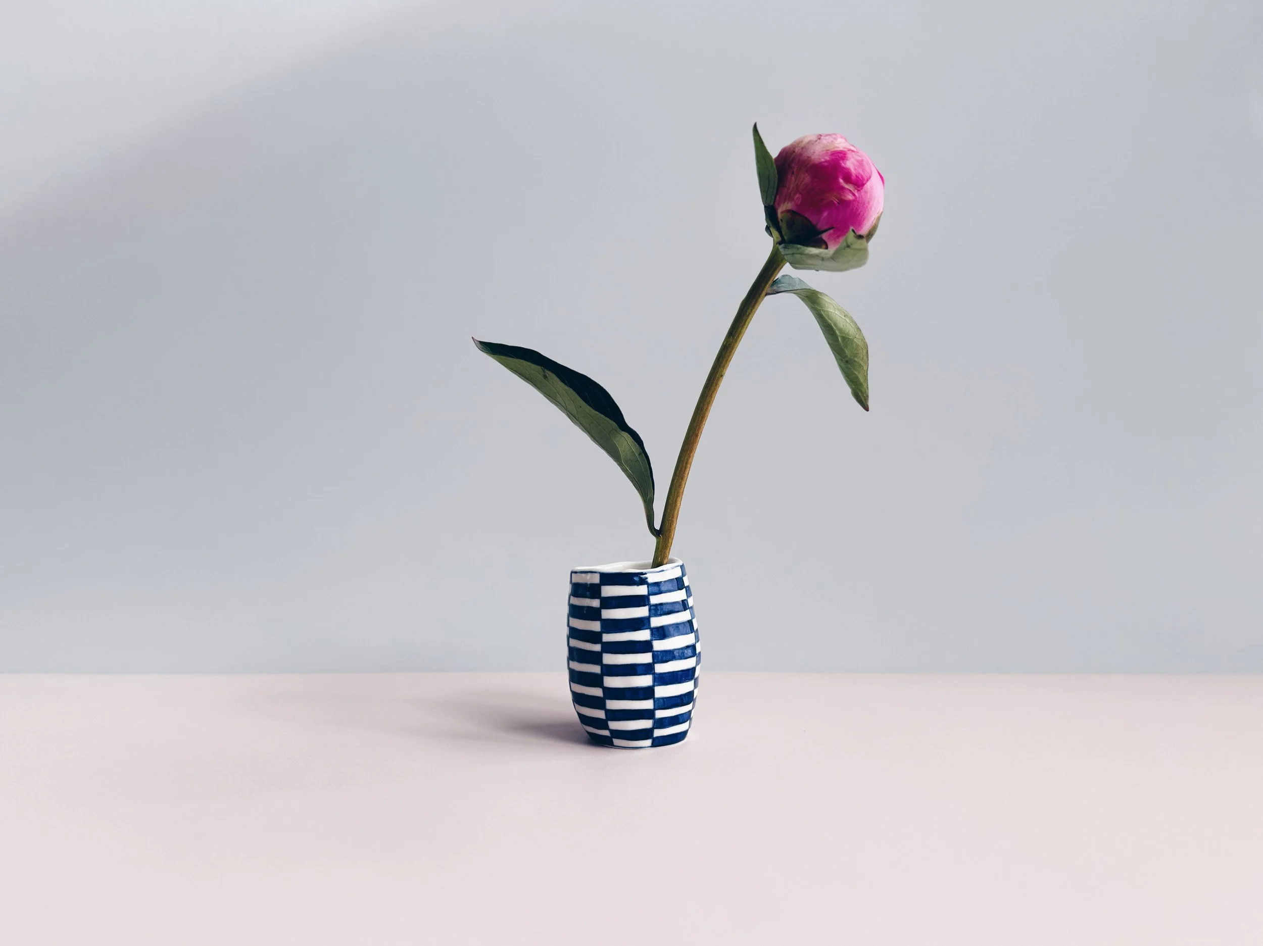 Blue and white, handmade ceramic vase.