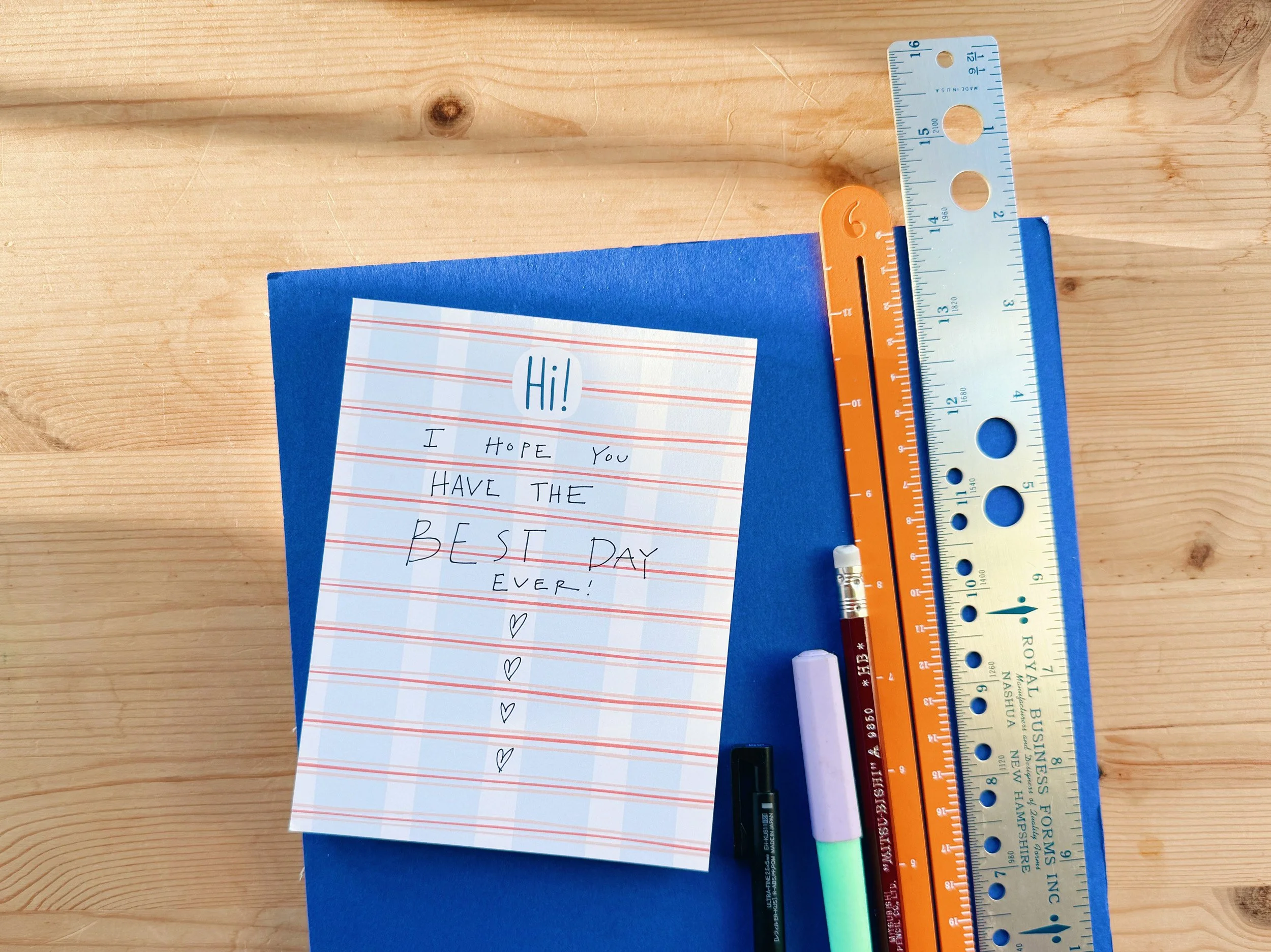 Notepad with blue and white plaid design
