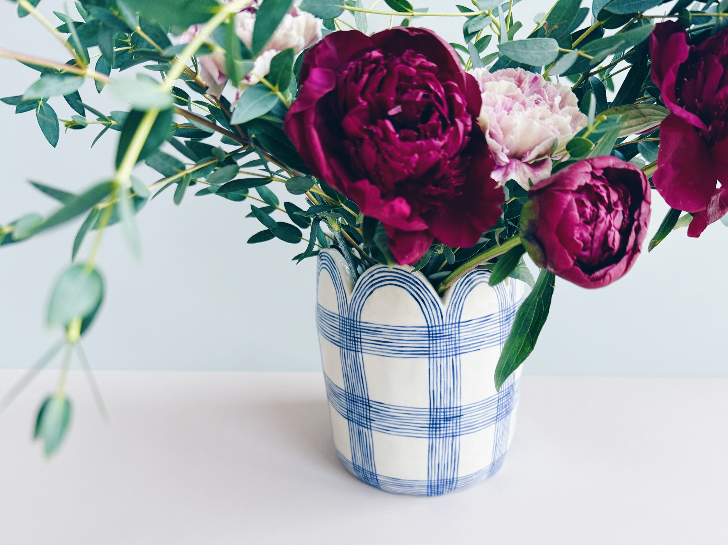 Blue and white, handmade ceramic vase.