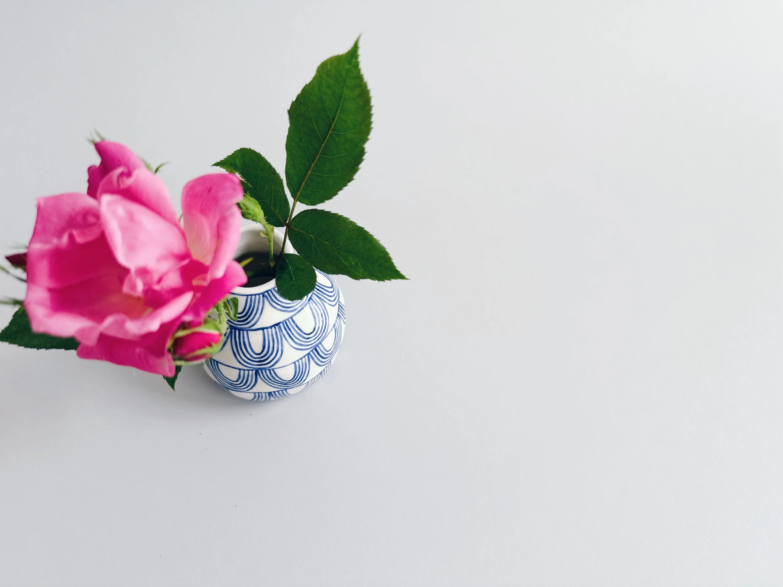 Blue and white, handmade ceramic vase.