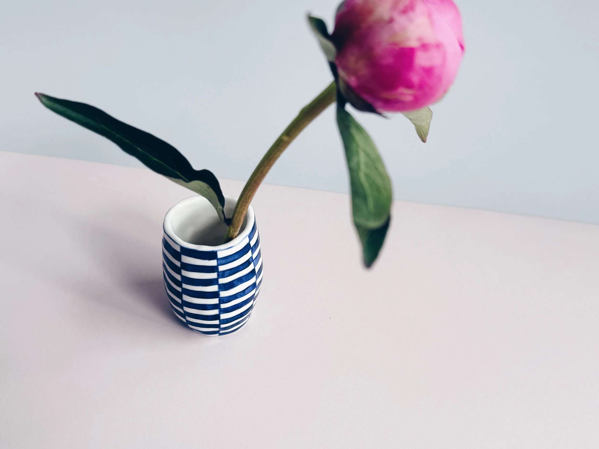 Blue and white, handmade ceramic vase.
