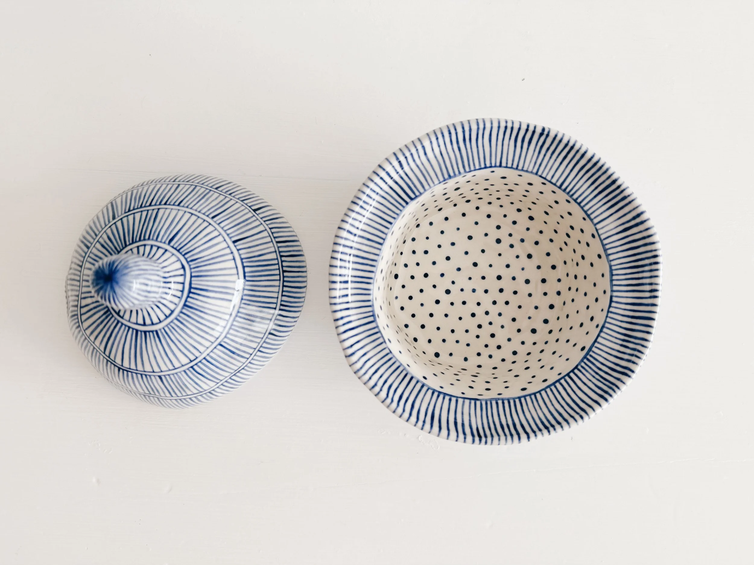 Blue and white, handmade ceramic jar.