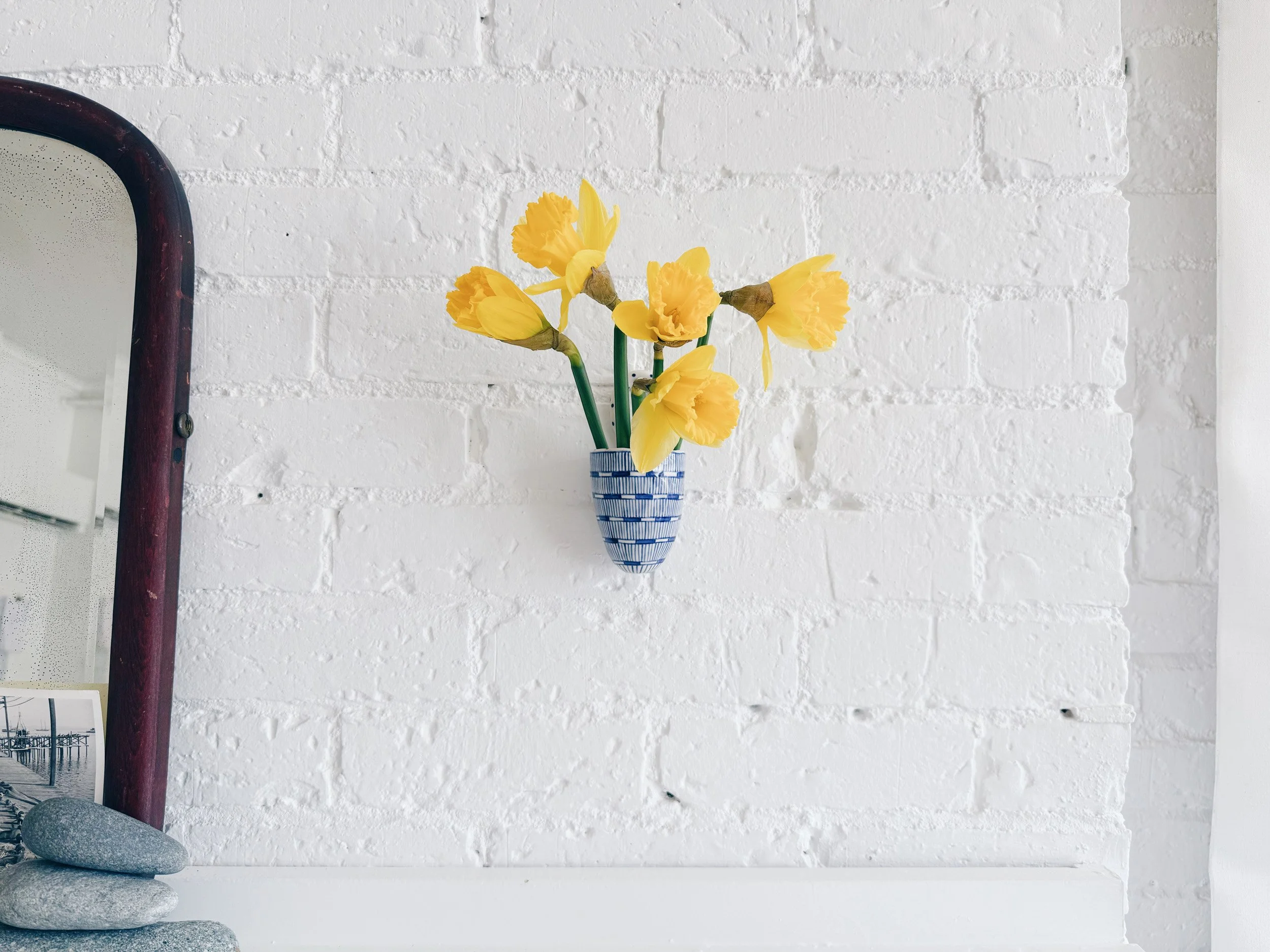 Blue and white, handmade ceramic vessel.