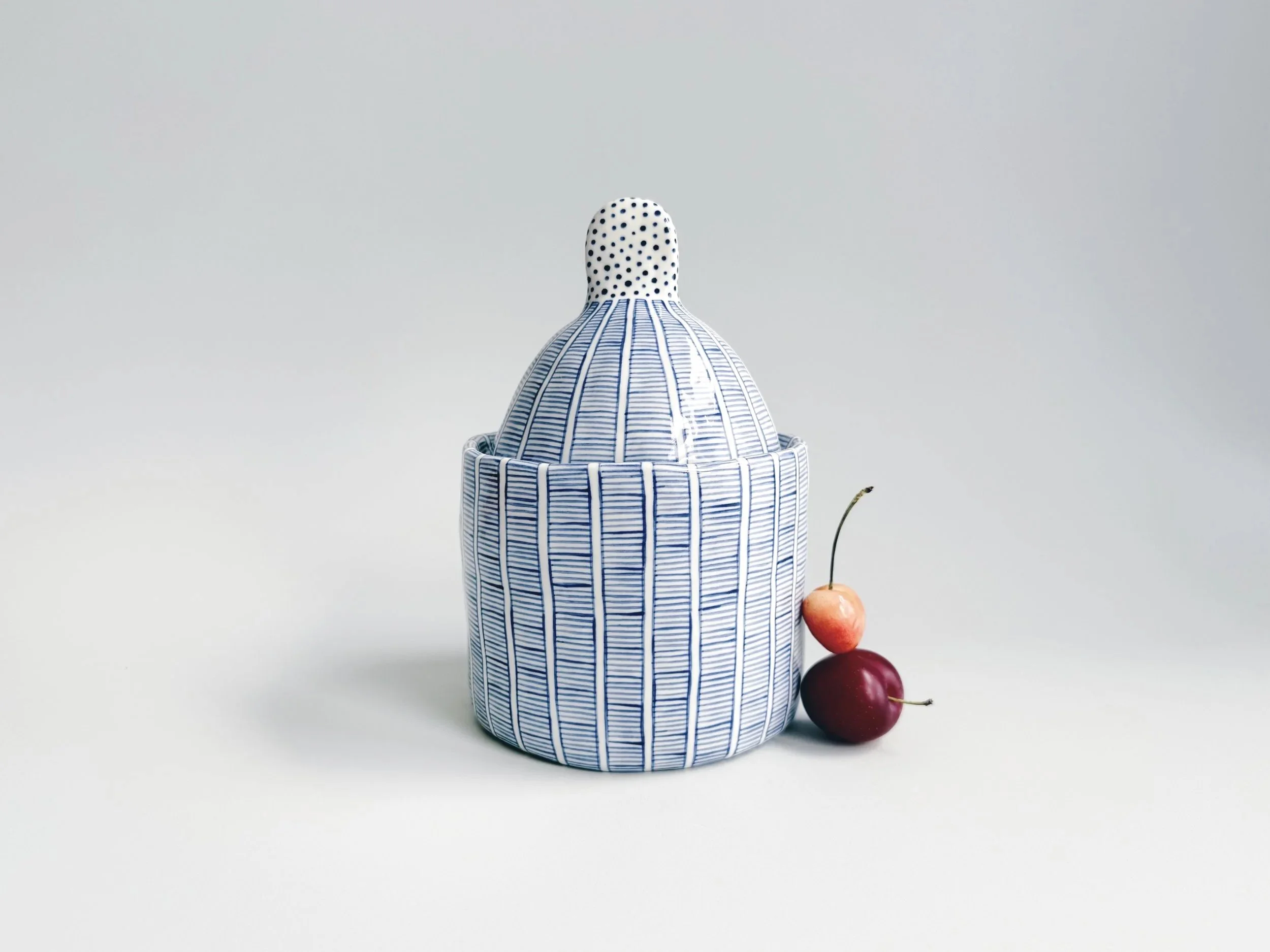 Blue and white, handmade ceramic jar.
