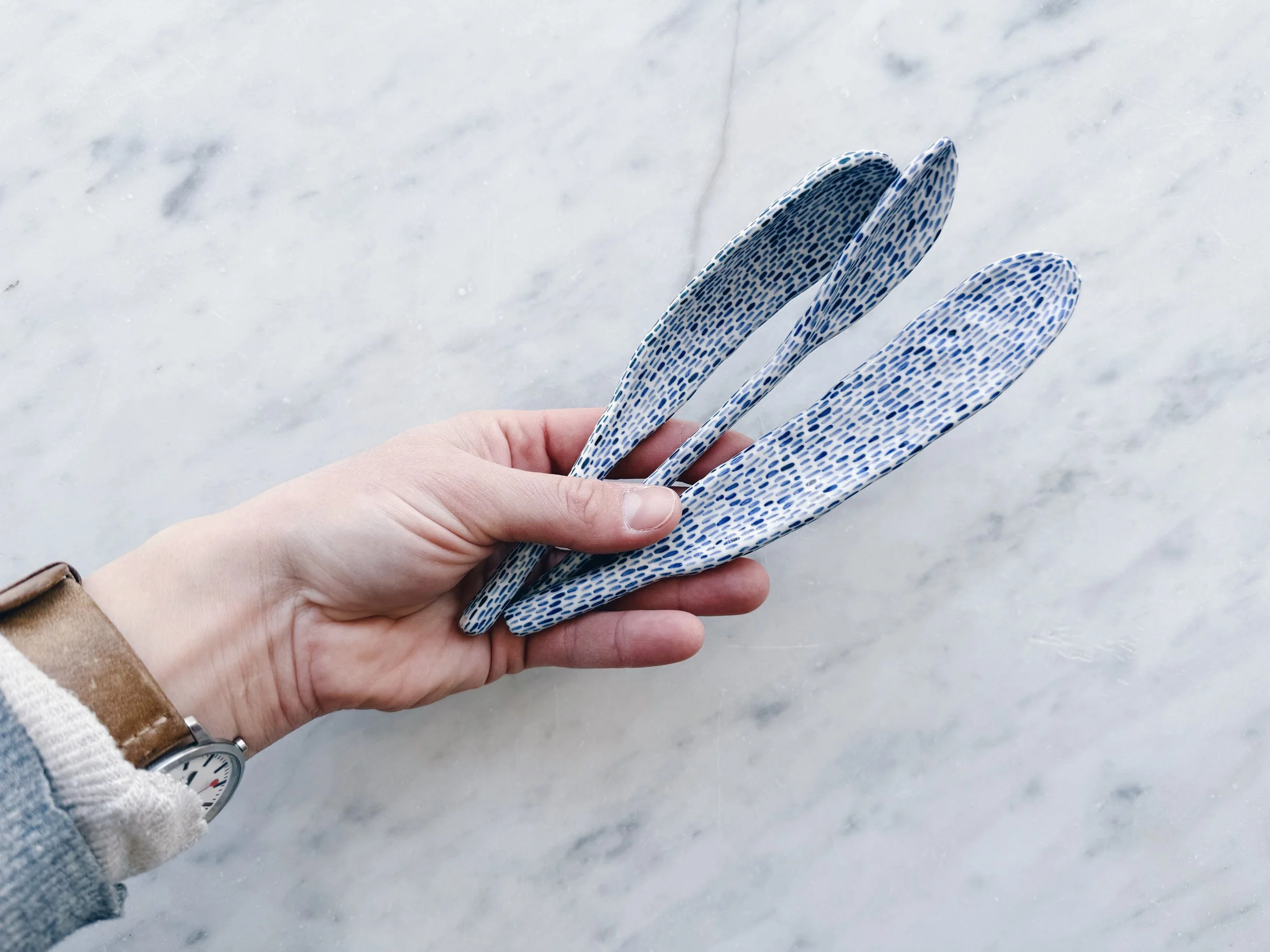 Blue and white, handmade ceramic sculpture.