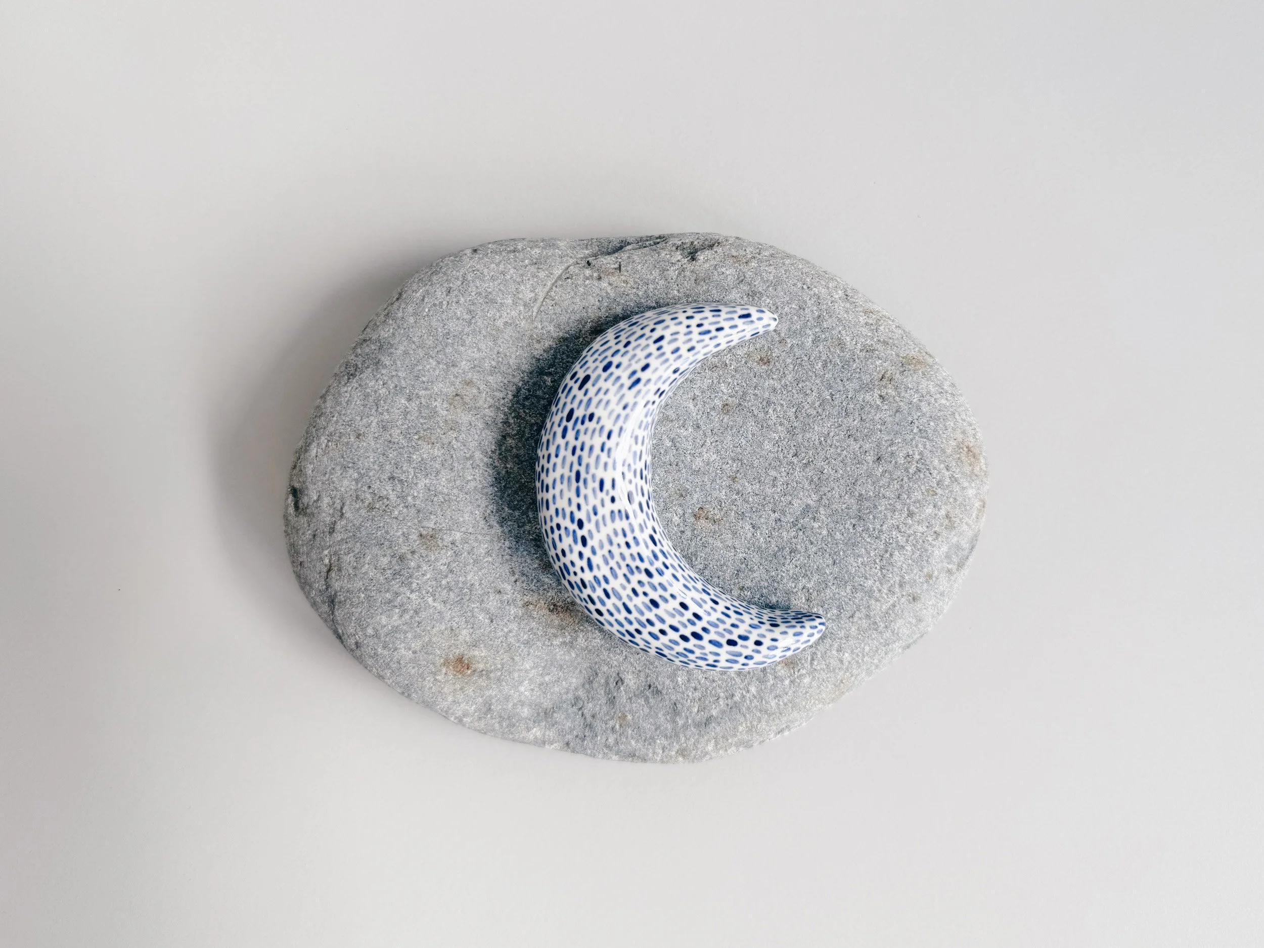 Blue and white, handmade ceramic moon