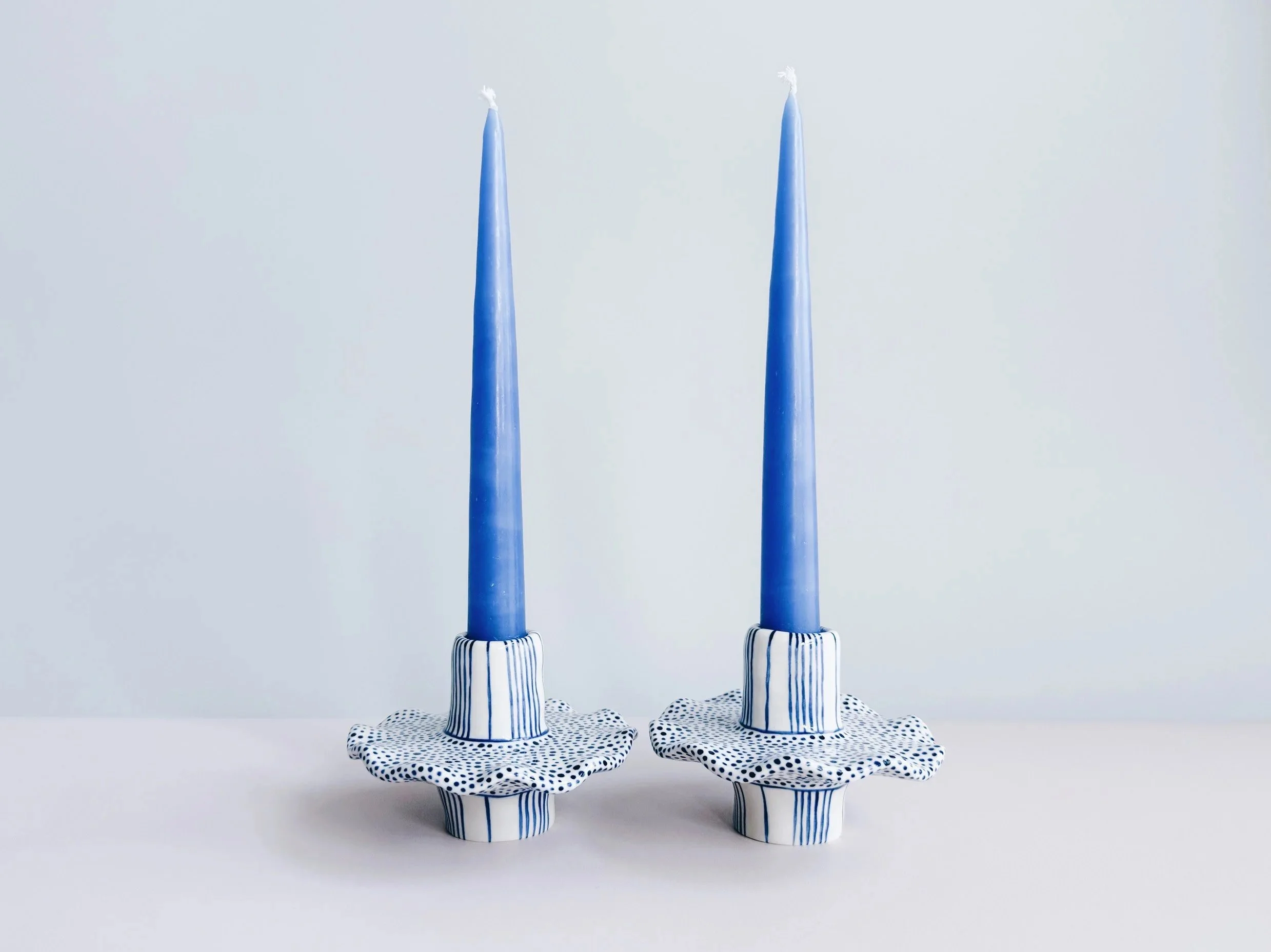 Blue and white, handmade ceramic candleholder.
