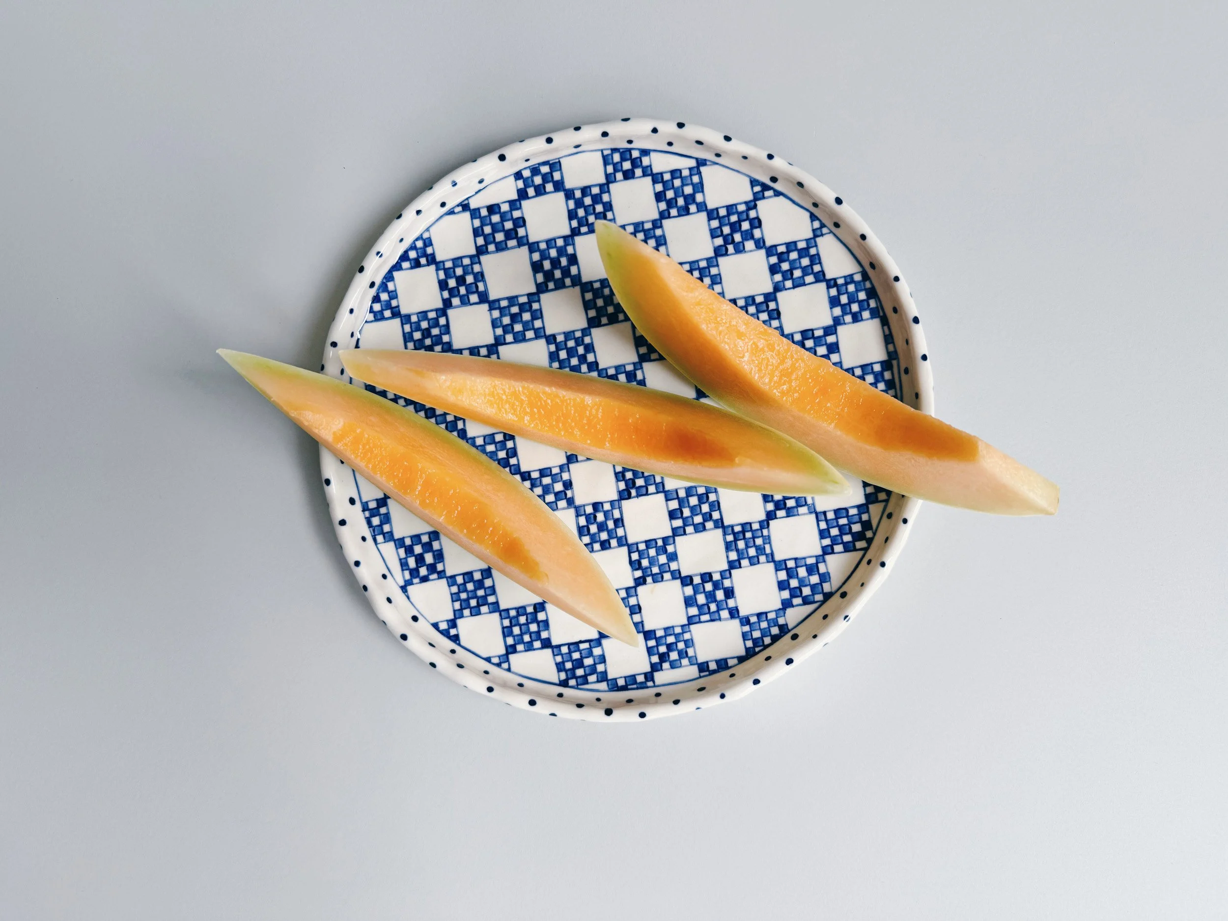 Blue and white, handmade ceramic plate.