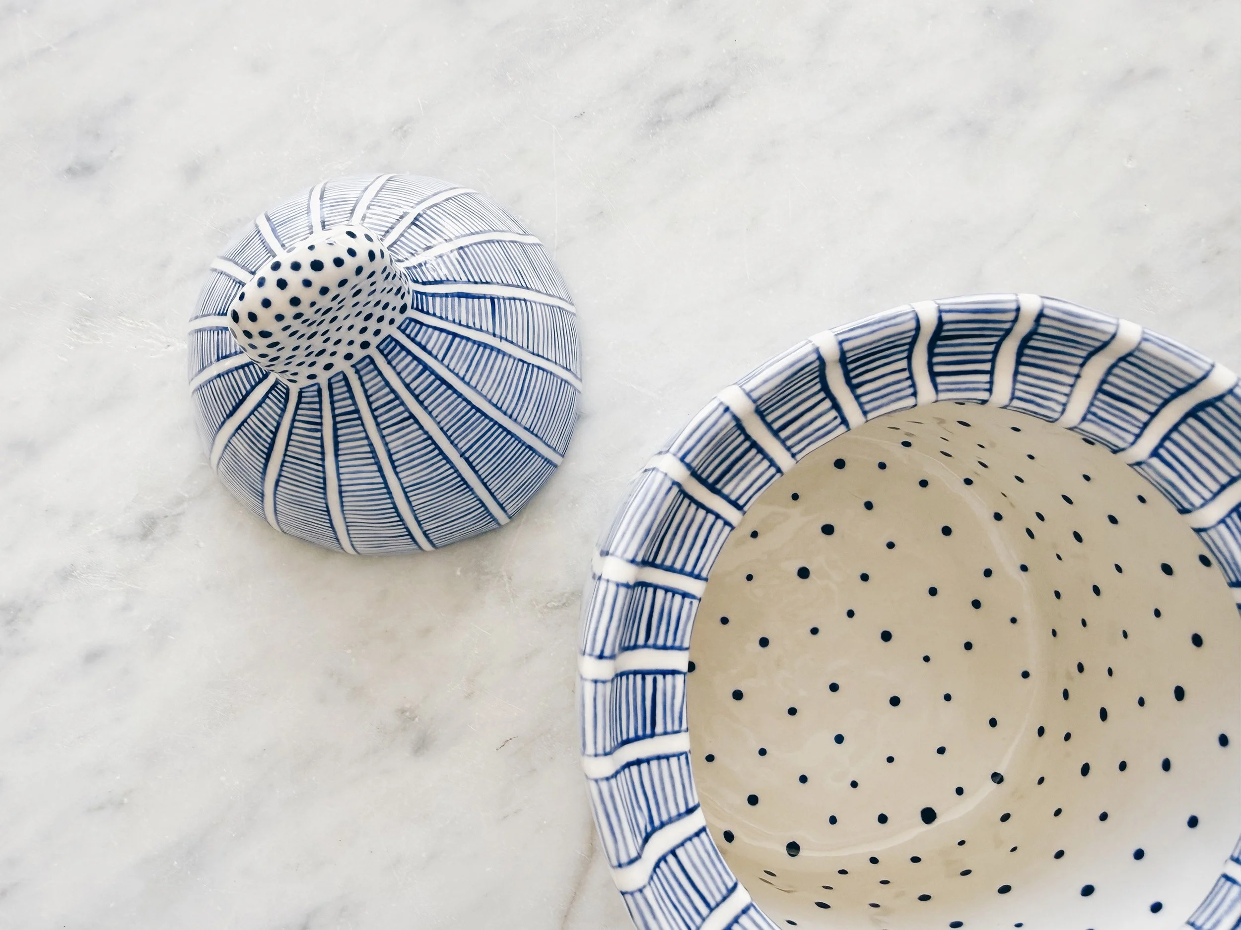 Blue and white, handmade ceramic jar.