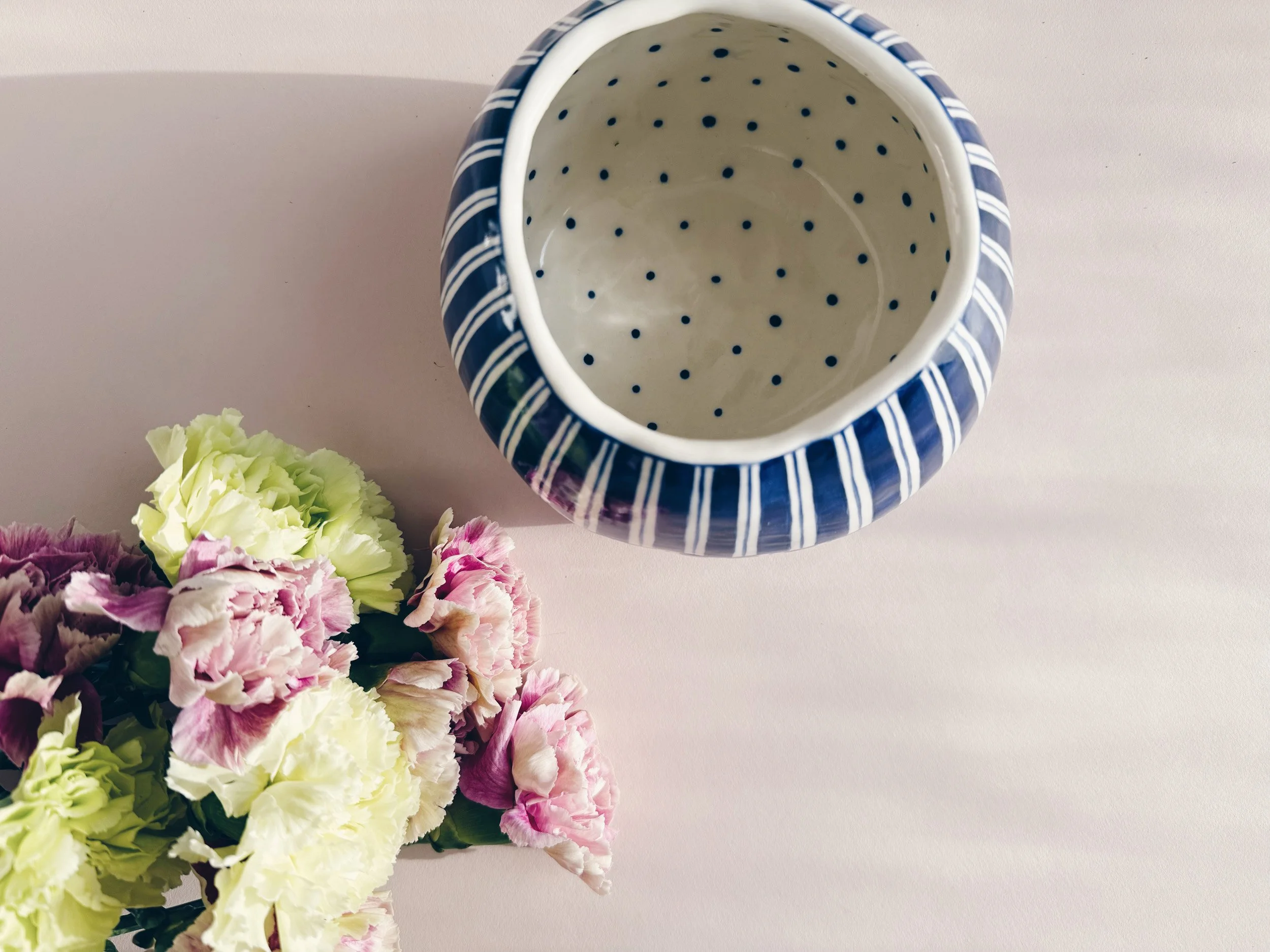 Blue and white, handmade ceramic vase.