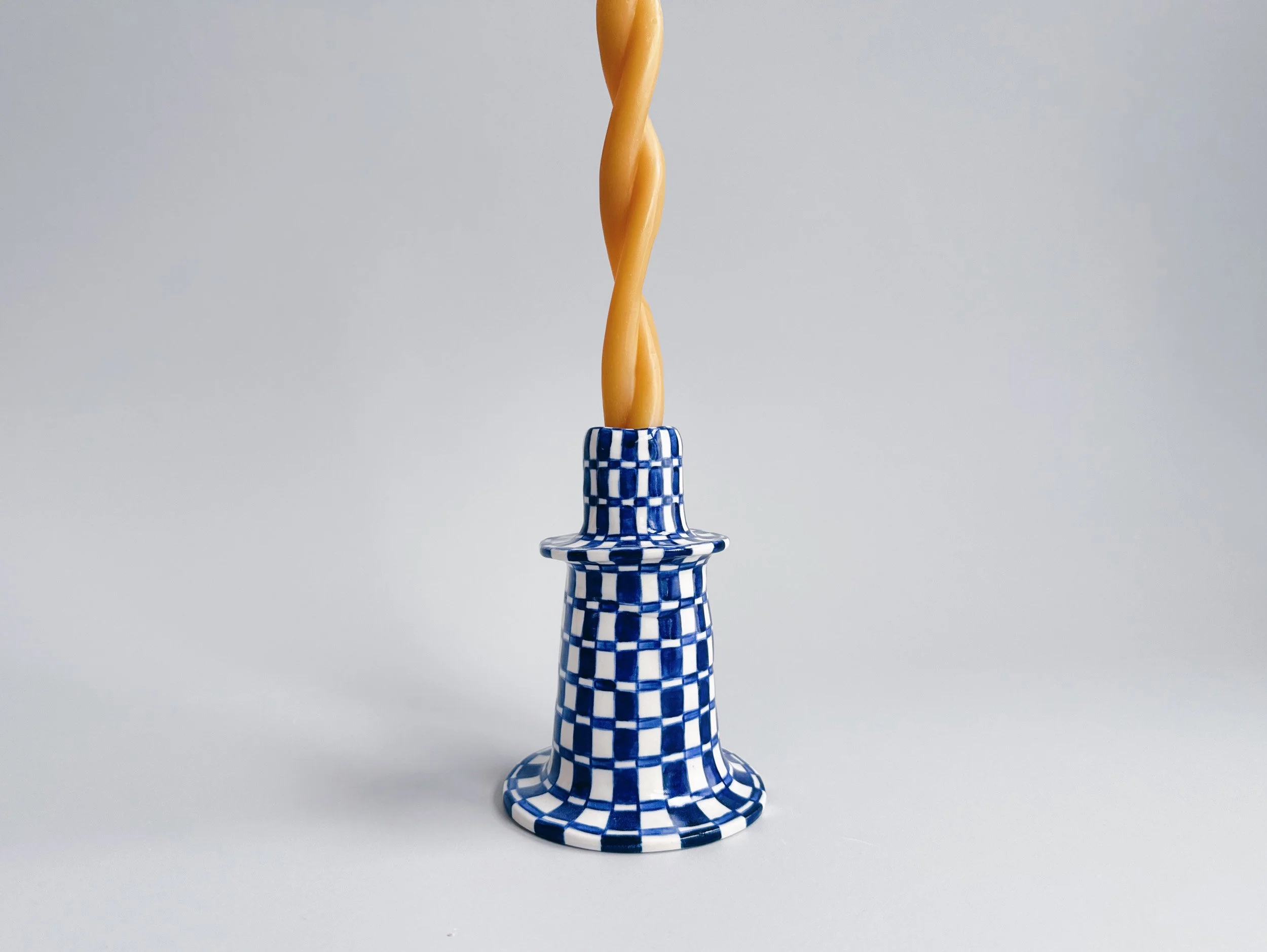 Blue and white, handmade ceramic candleholder.