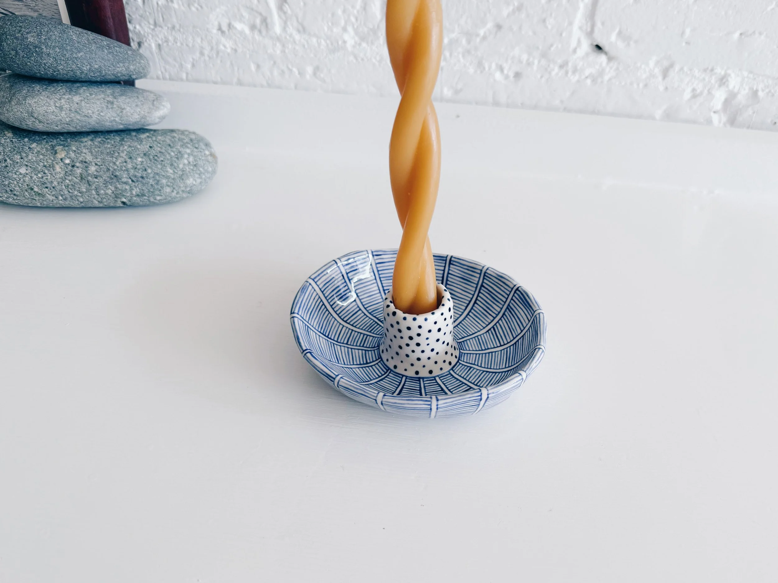 Blue and white, handmade ceramic candleholder.