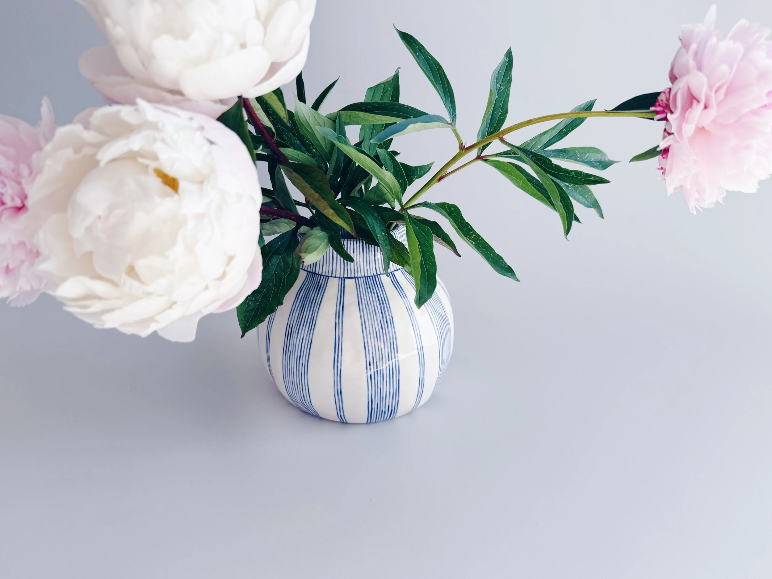 Blue and white, handmade ceramic vase.