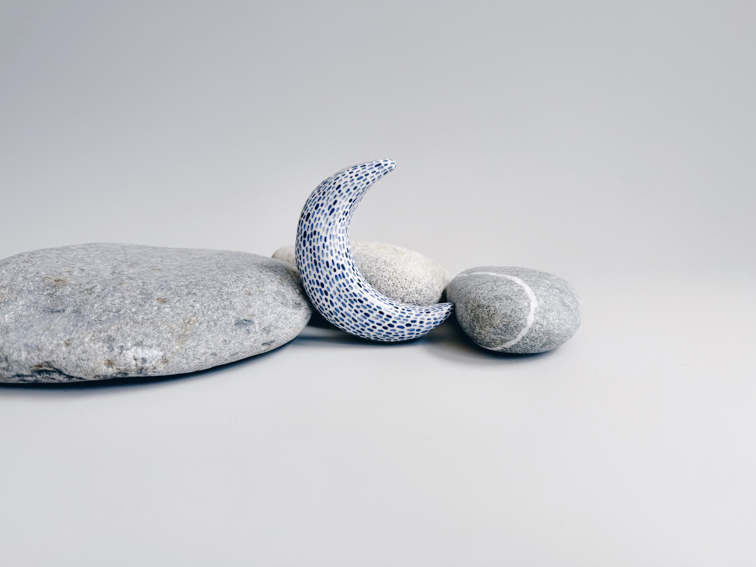 Blue and white, handmade ceramic moon