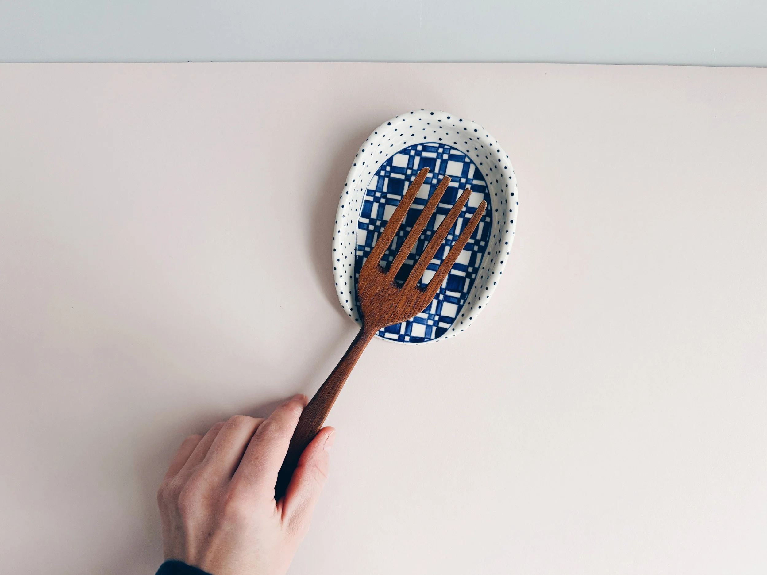 Blue and white, handmade ceramic spoon rest.