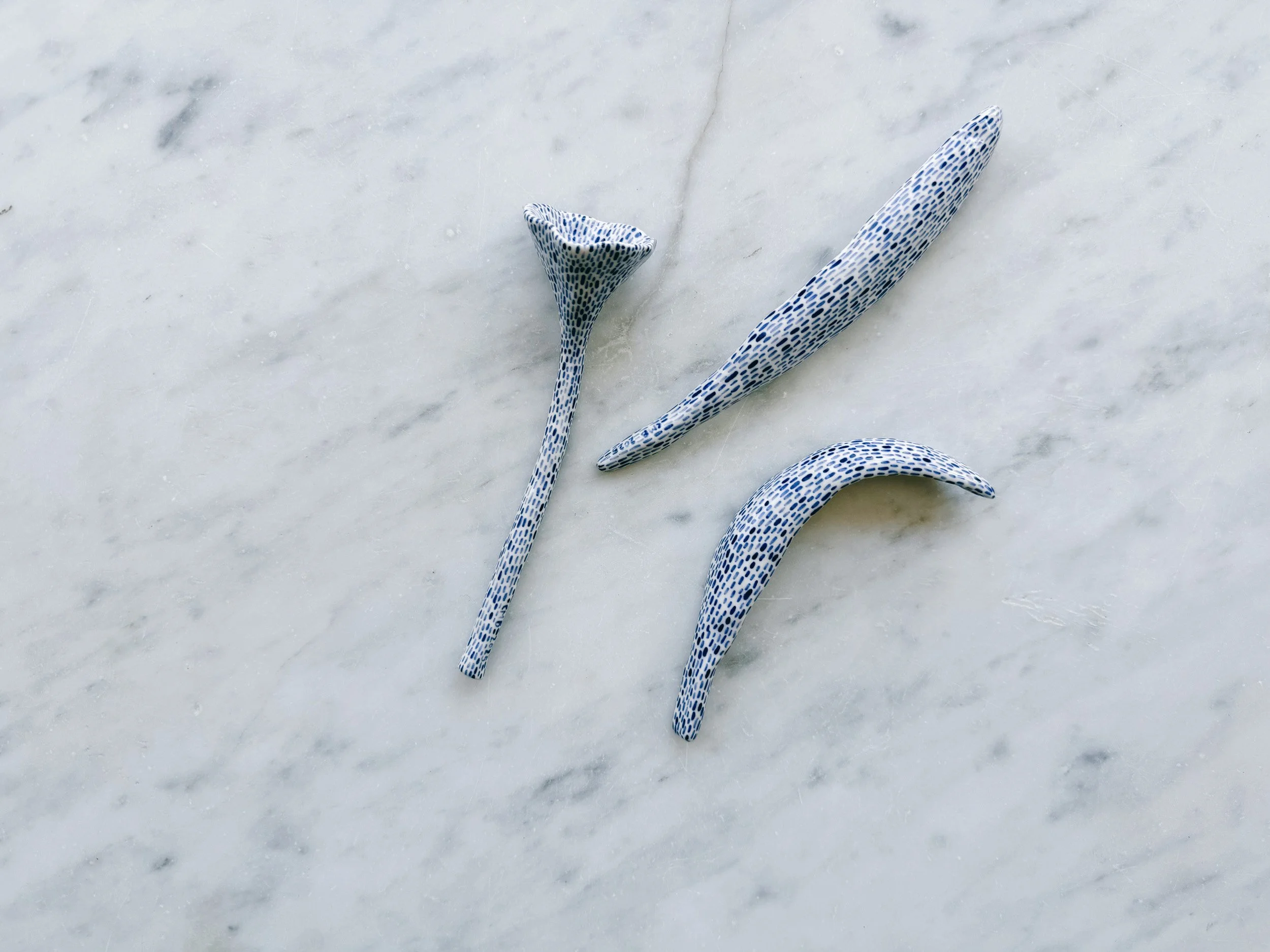 Blue and white, handmade ceramic sculpture.