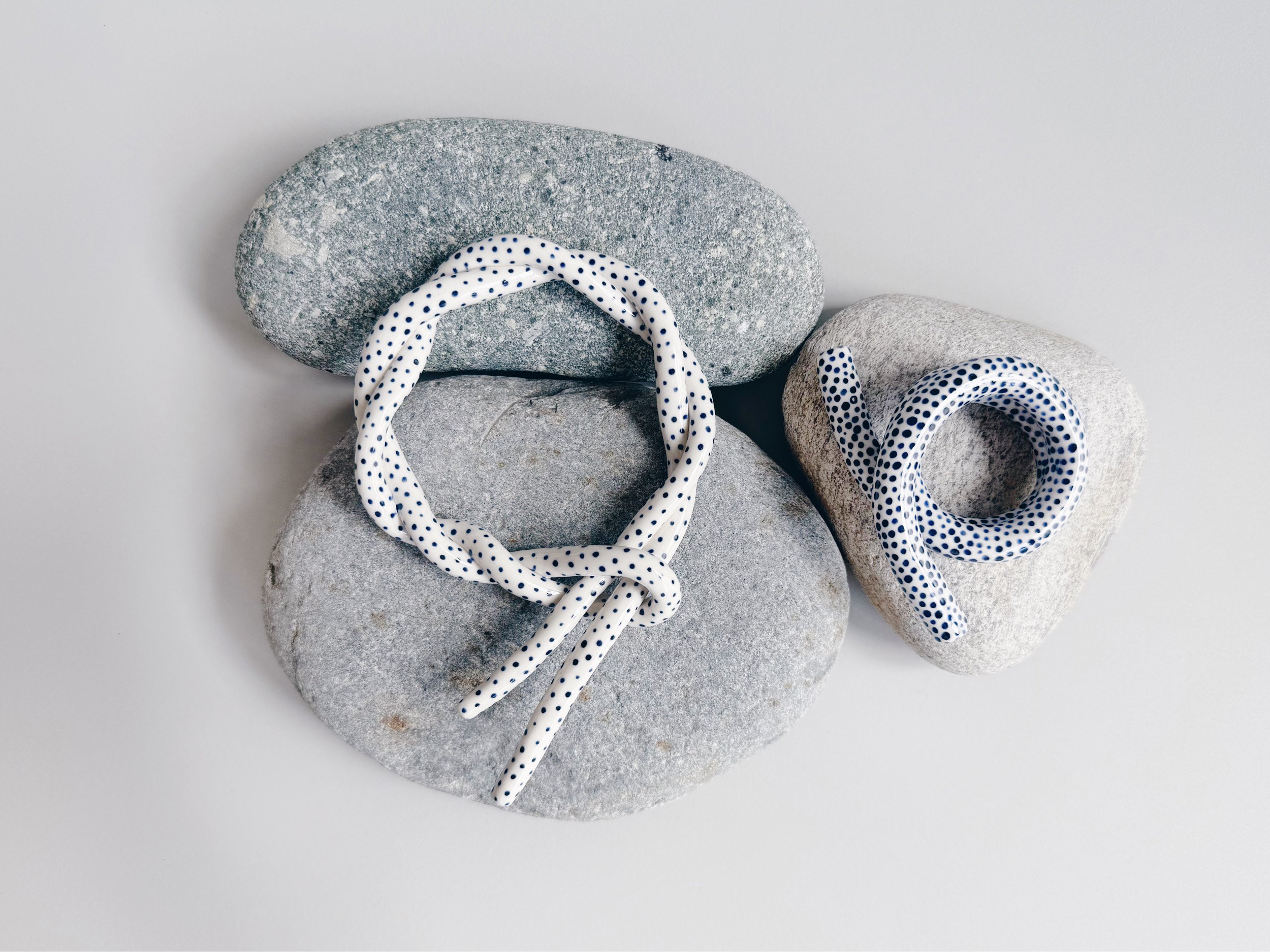 Blue and white, handmade ceramic squiggle