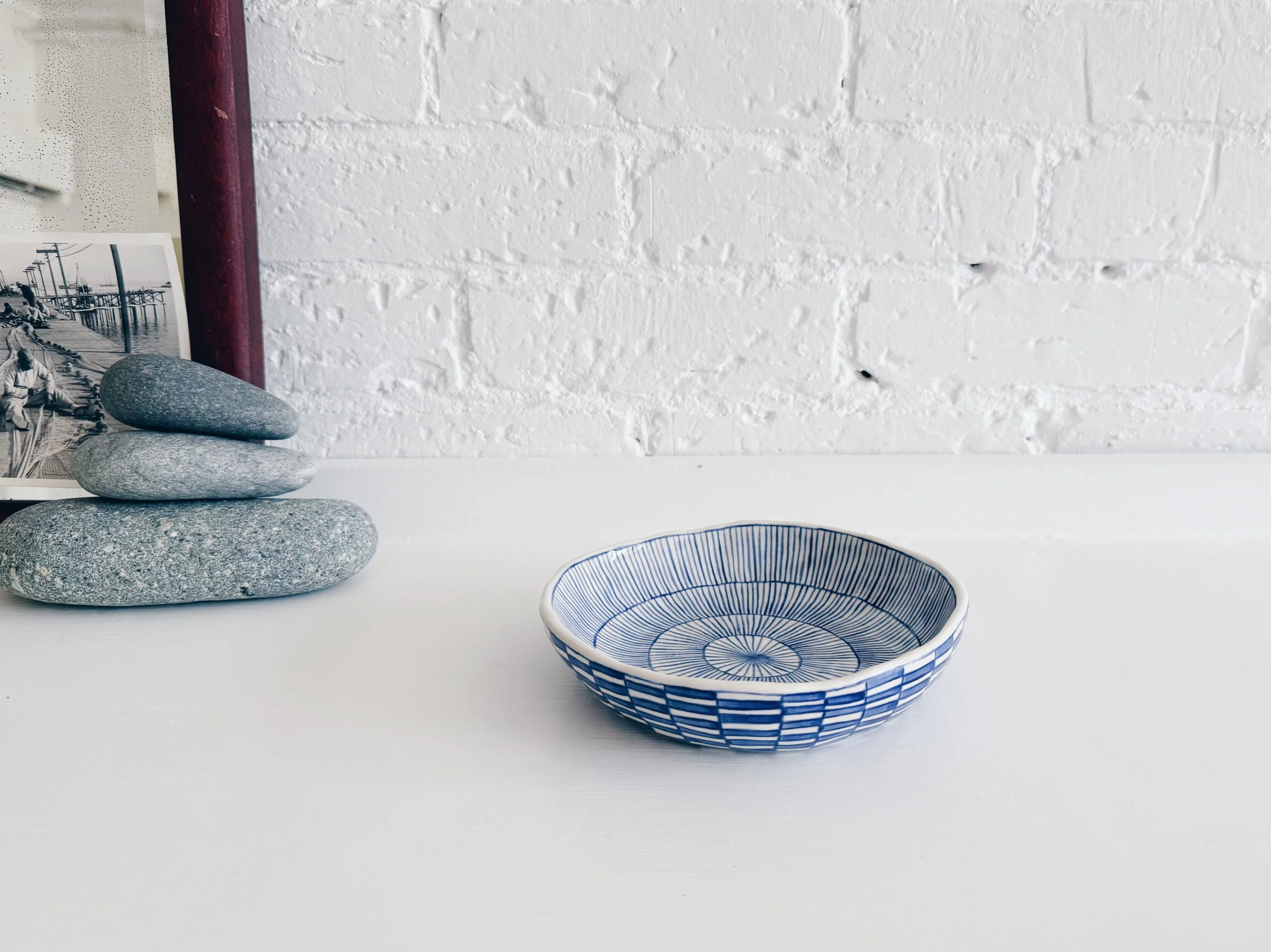 Blue and white, handmade ceramic bowl.