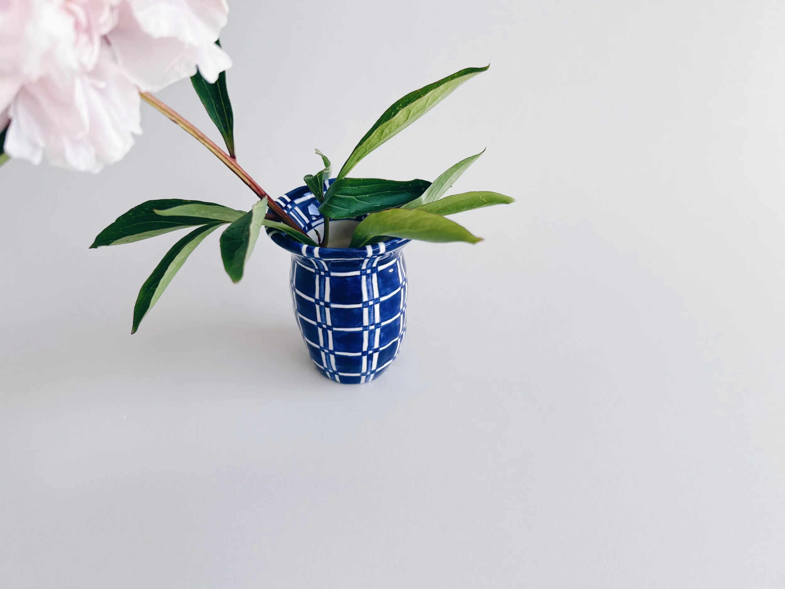 Blue and white, handmade ceramic vase.