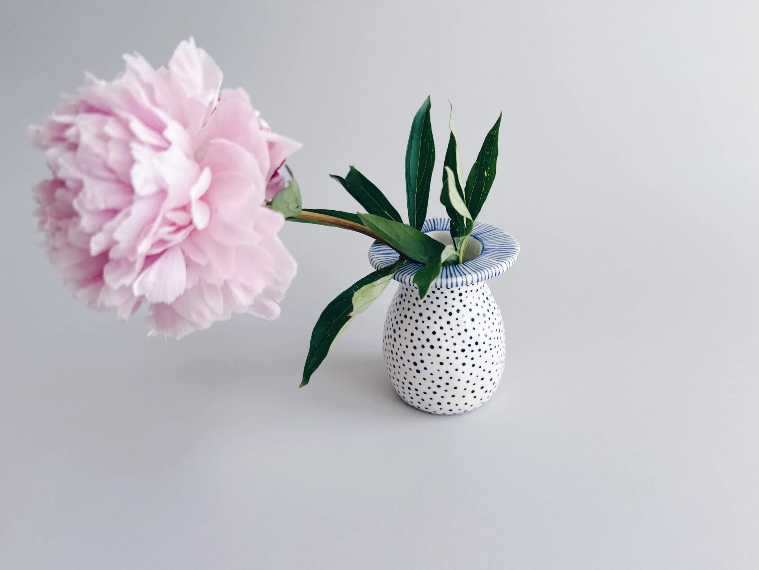 Blue and white, handmade ceramic vase.