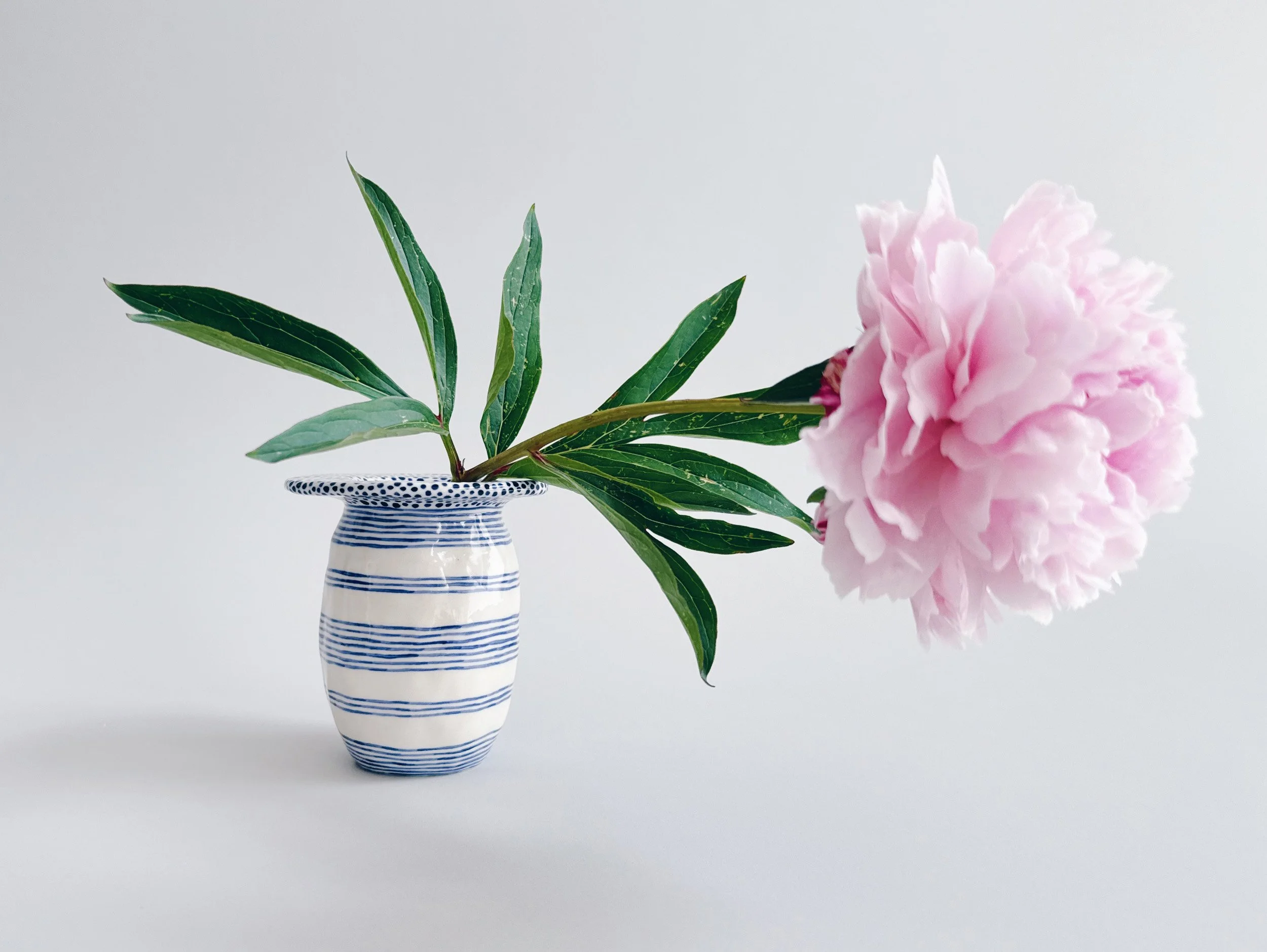 Blue and white, handmade ceramic vase.