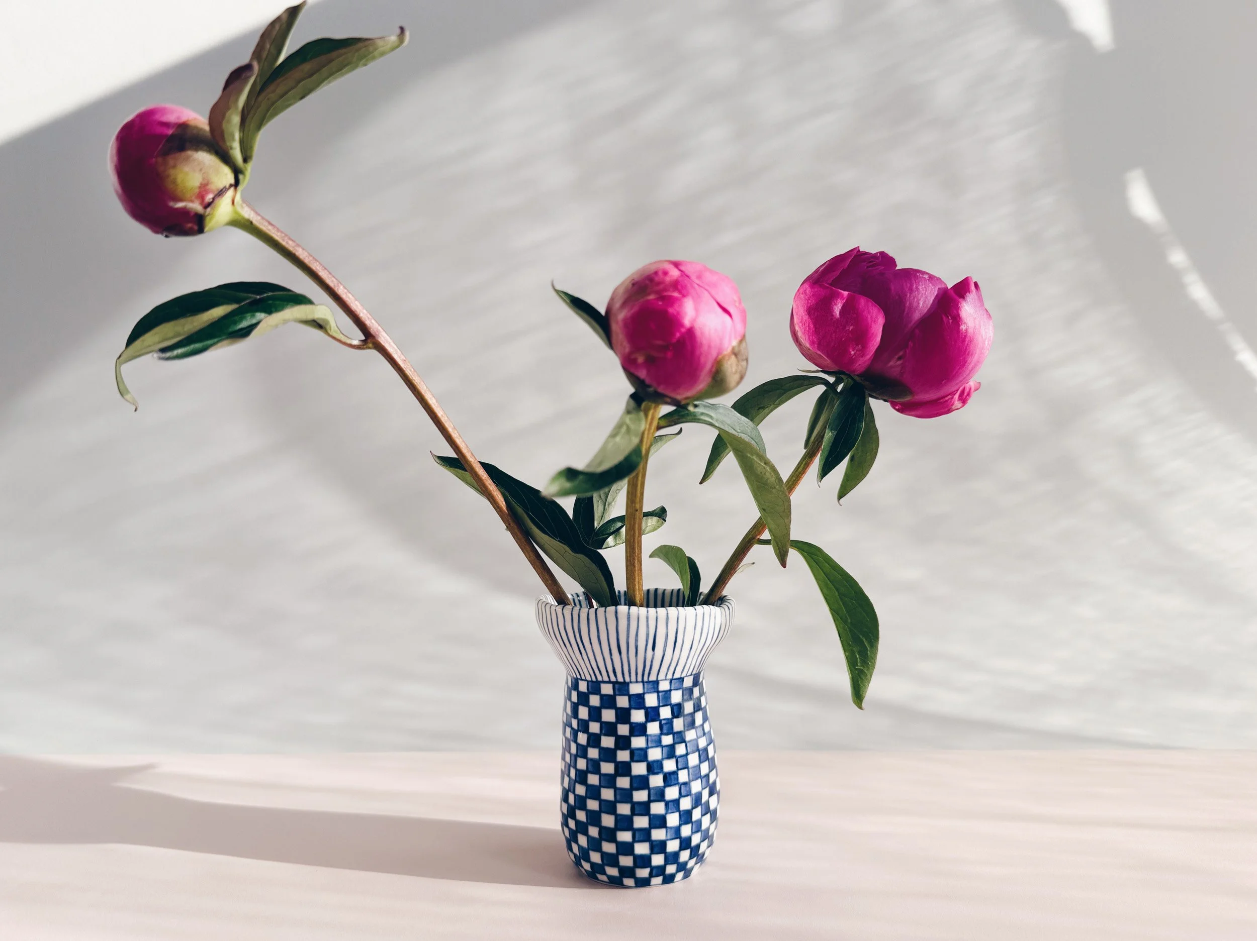 Blue and white, handmade ceramic vase.