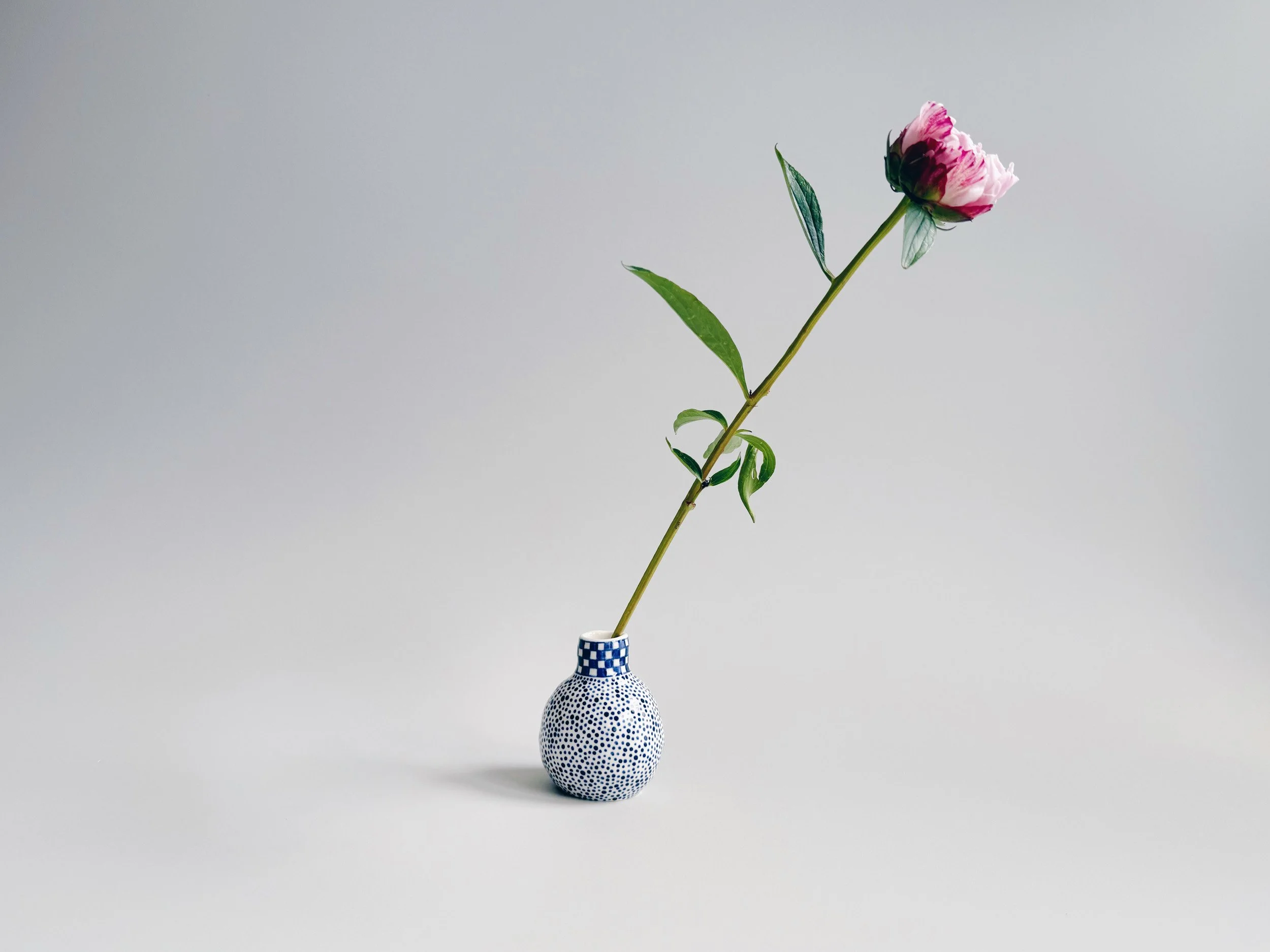 Blue and white, handmade ceramic vase.