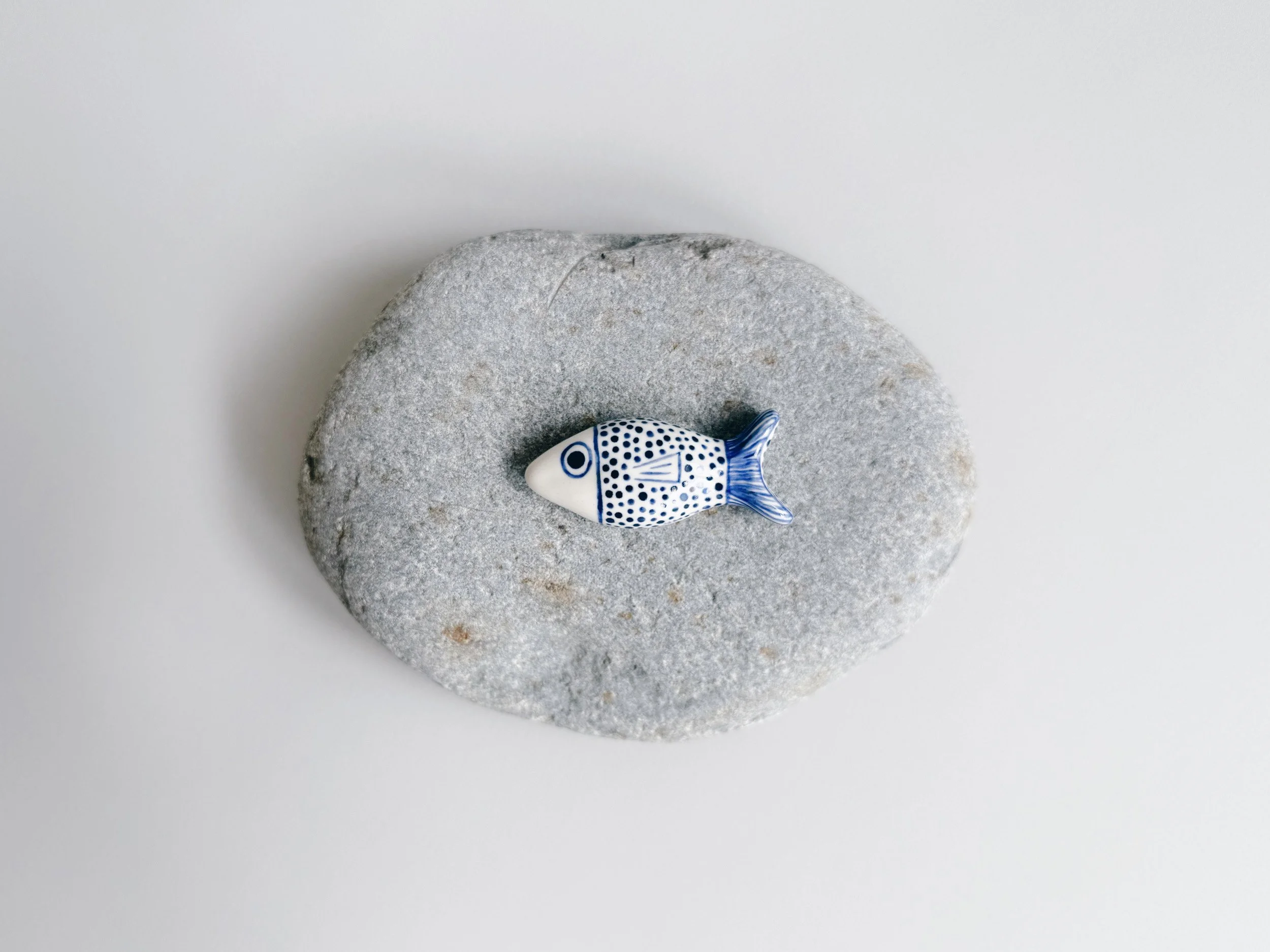 Blue and white, handmade ceramic fish.