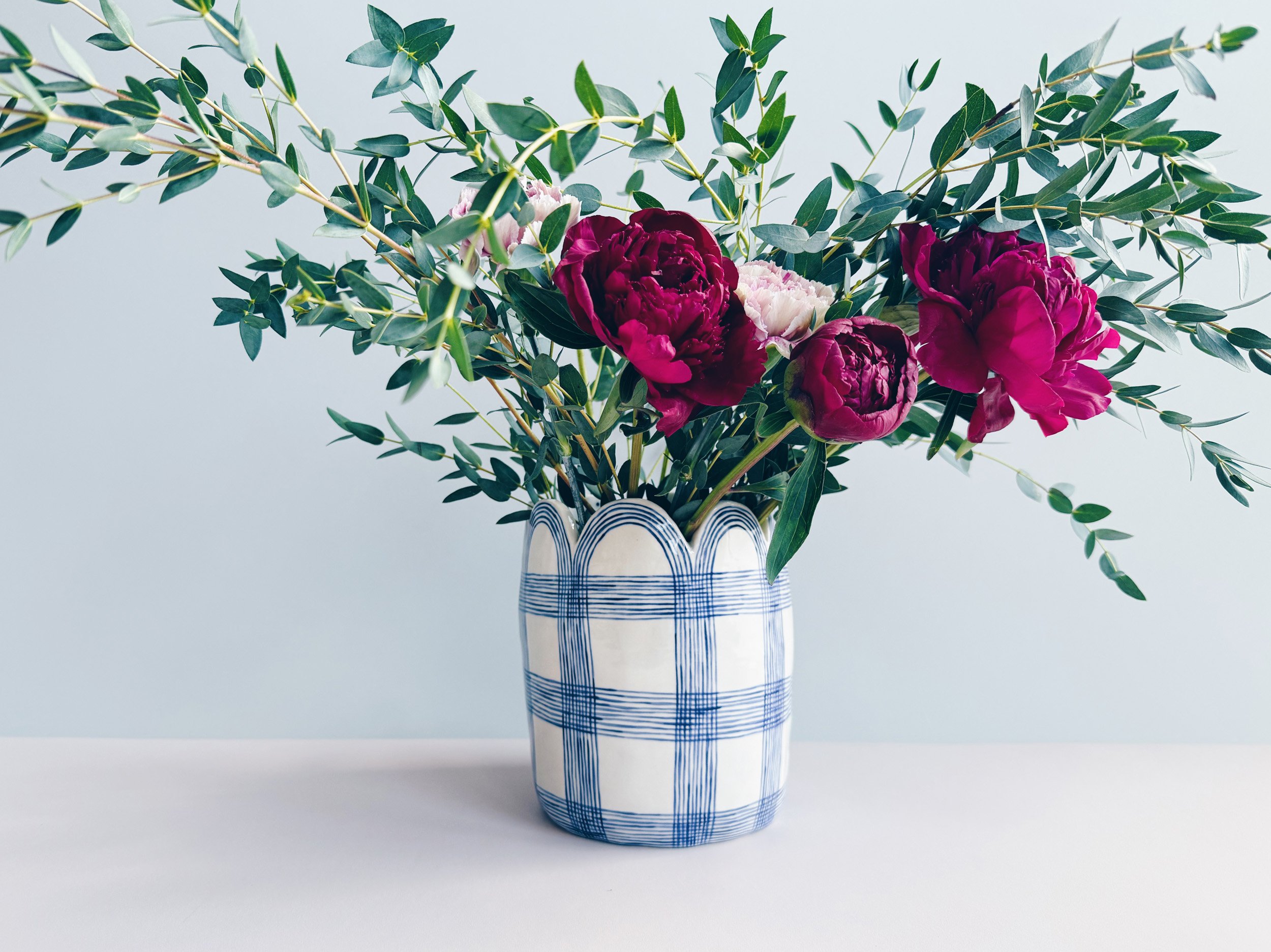 Blue and white, handmade ceramic vase.