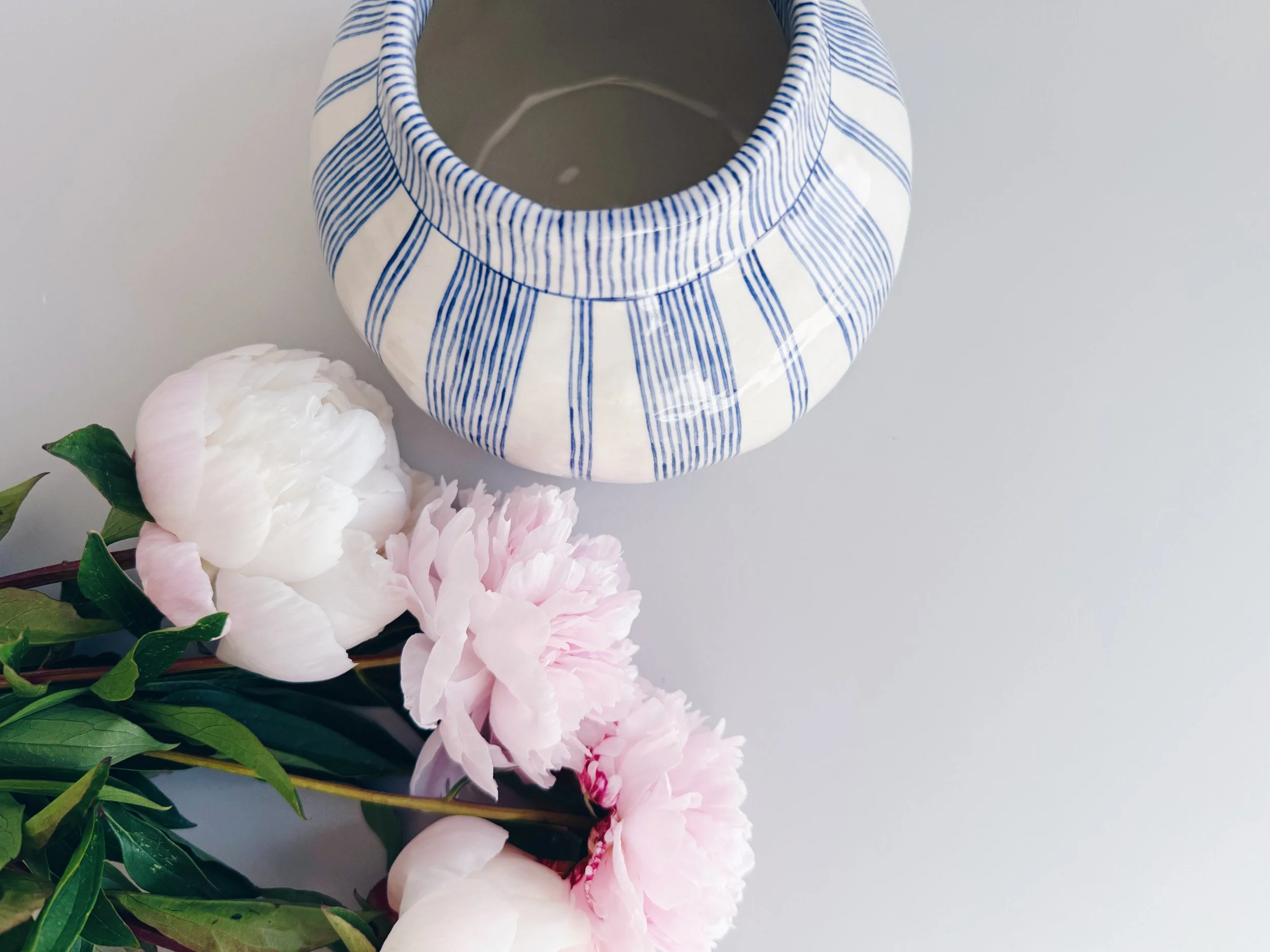Blue and white, handmade ceramic vase.