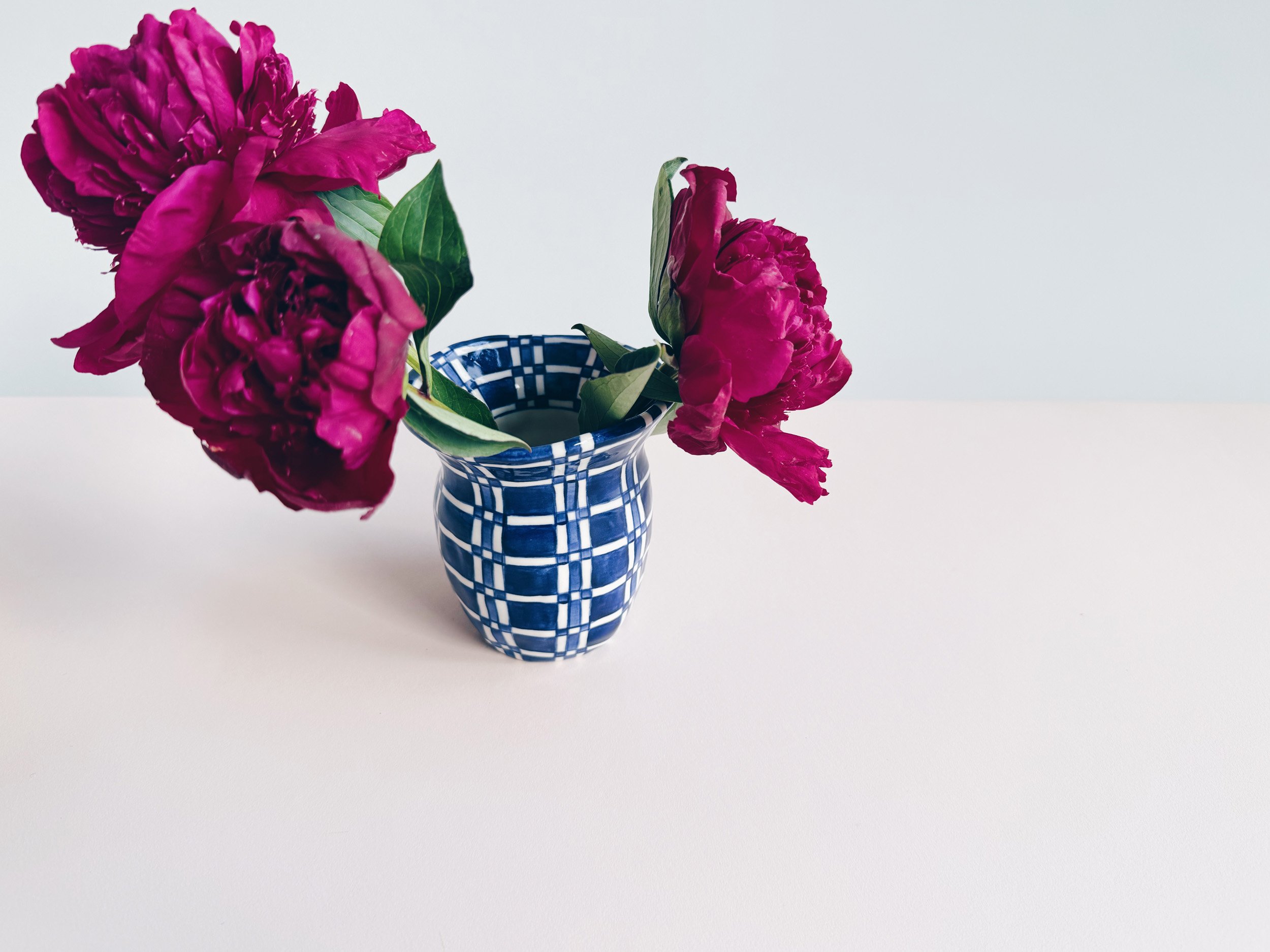 Blue and white, handmade ceramic vase.