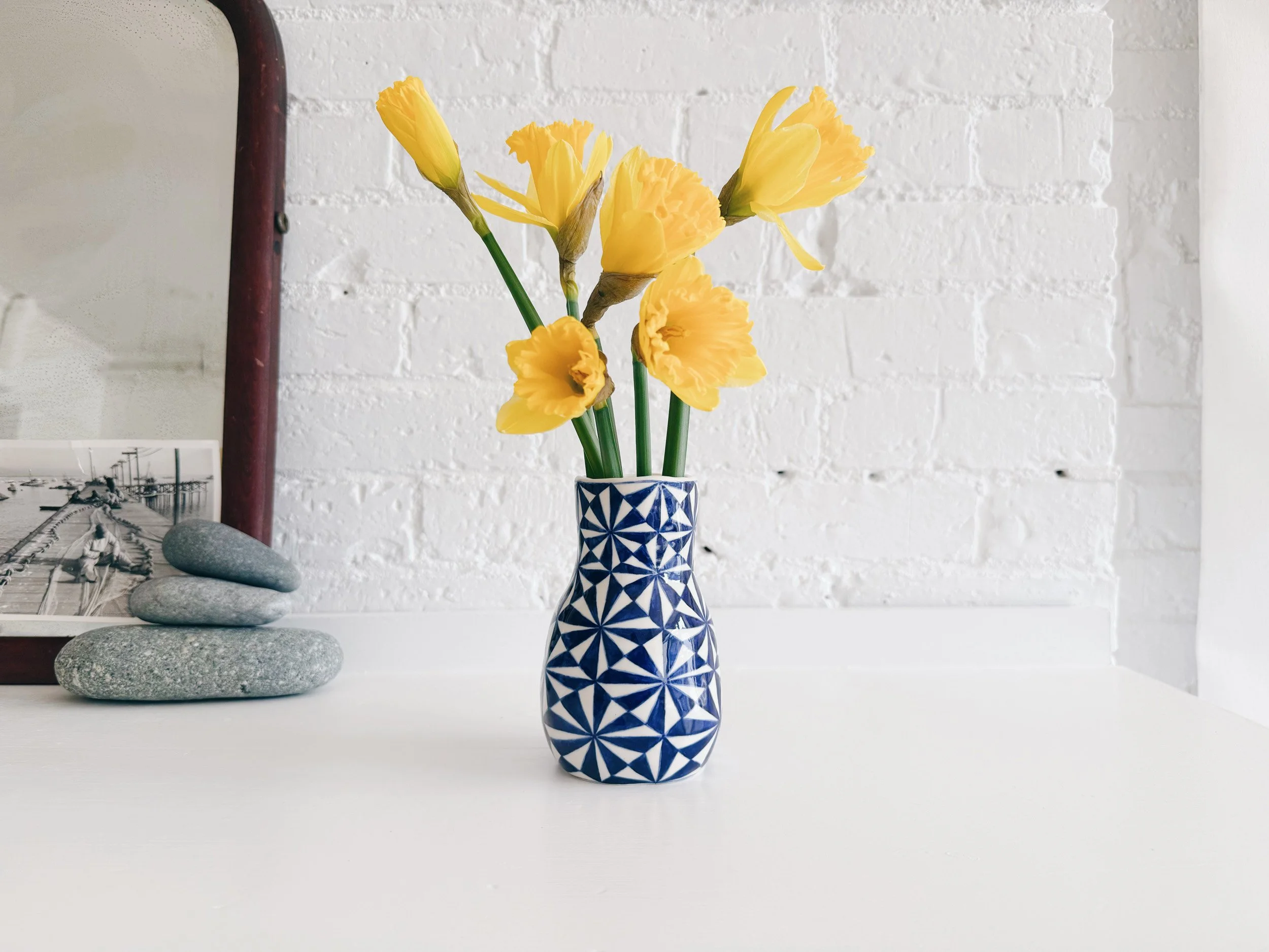 Blue and white, handmade ceramic vase.