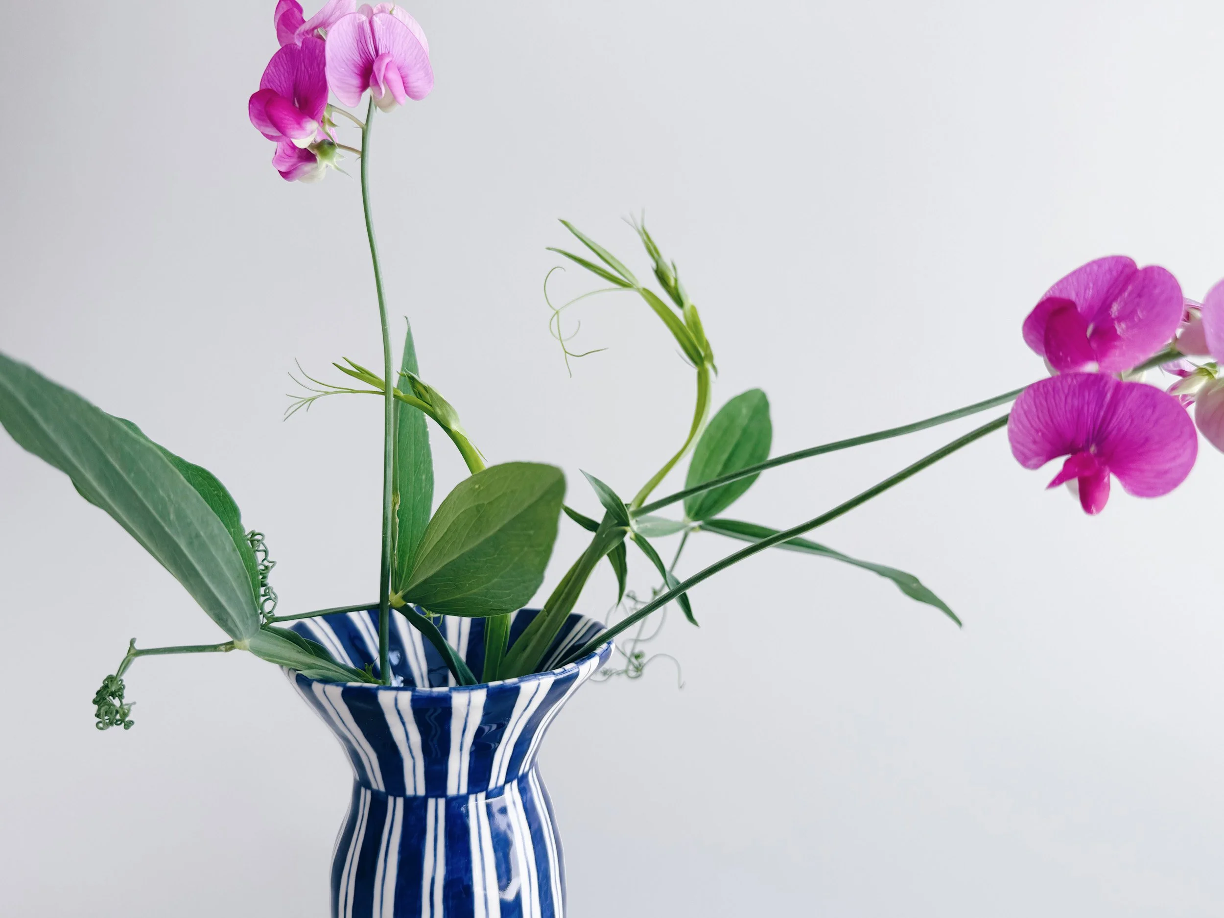 Blue and white, handmade ceramic vase.