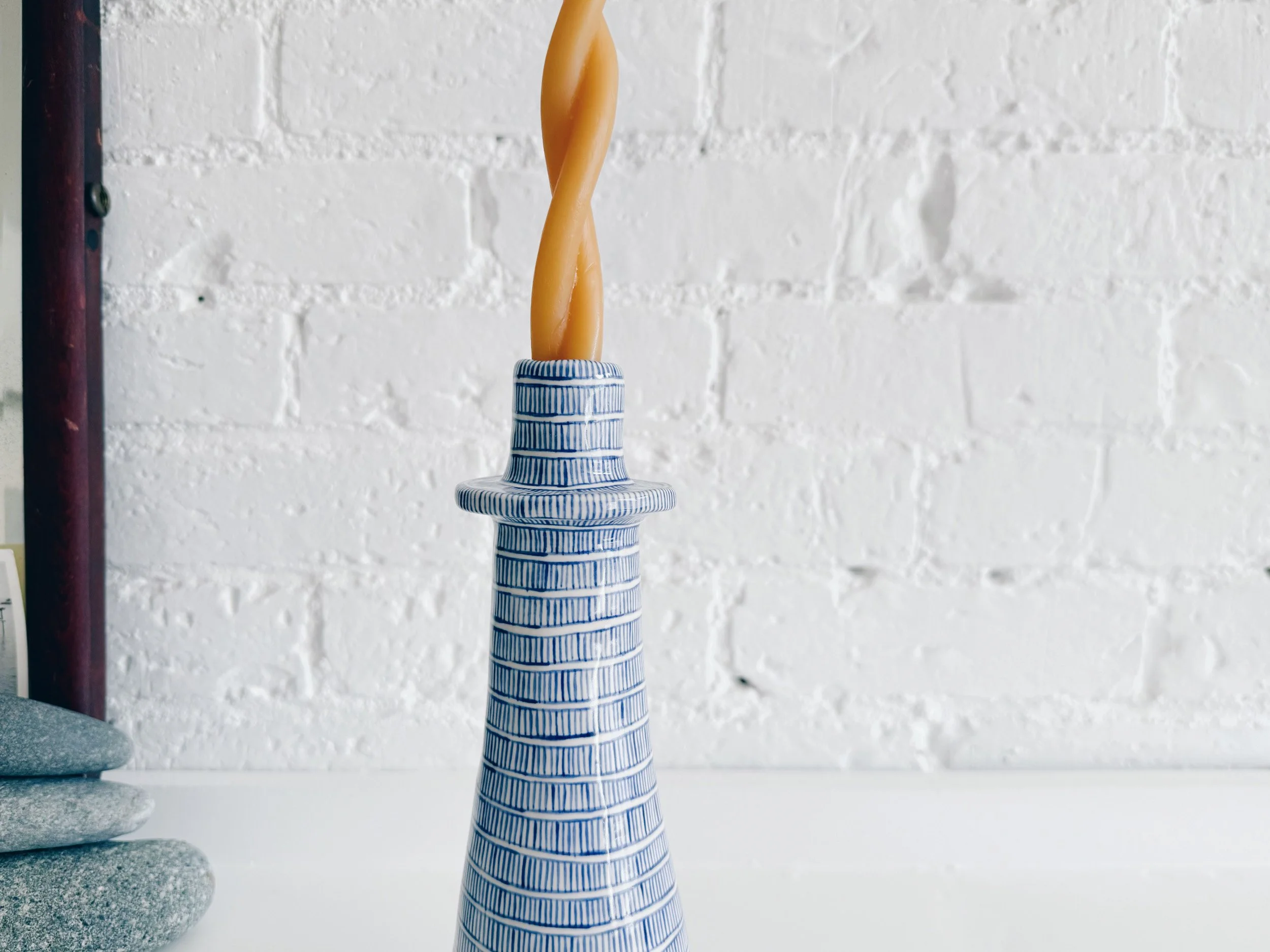 Blue and white, handmade ceramic candleholder.