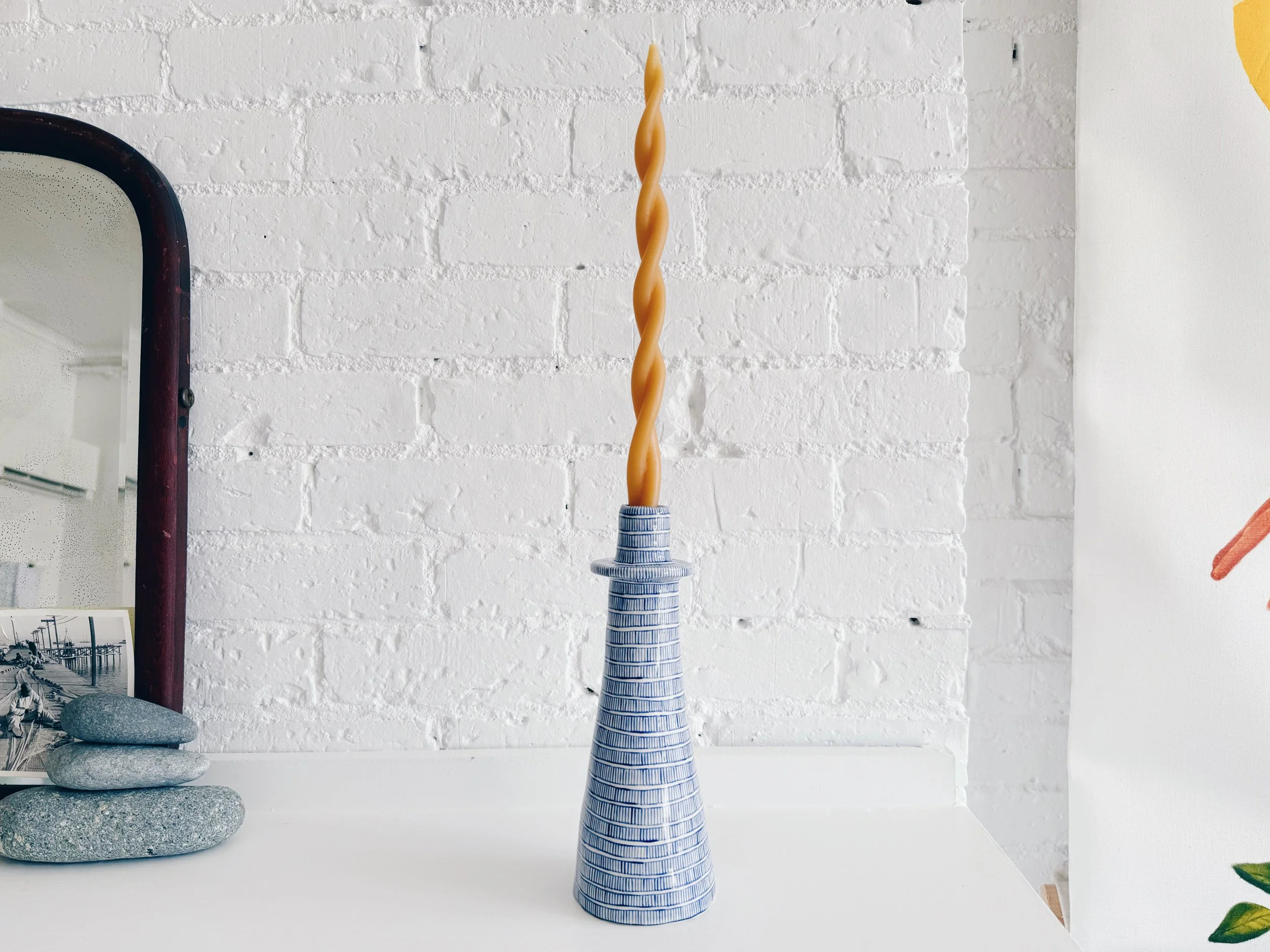 Blue and white, handmade ceramic candleholder.