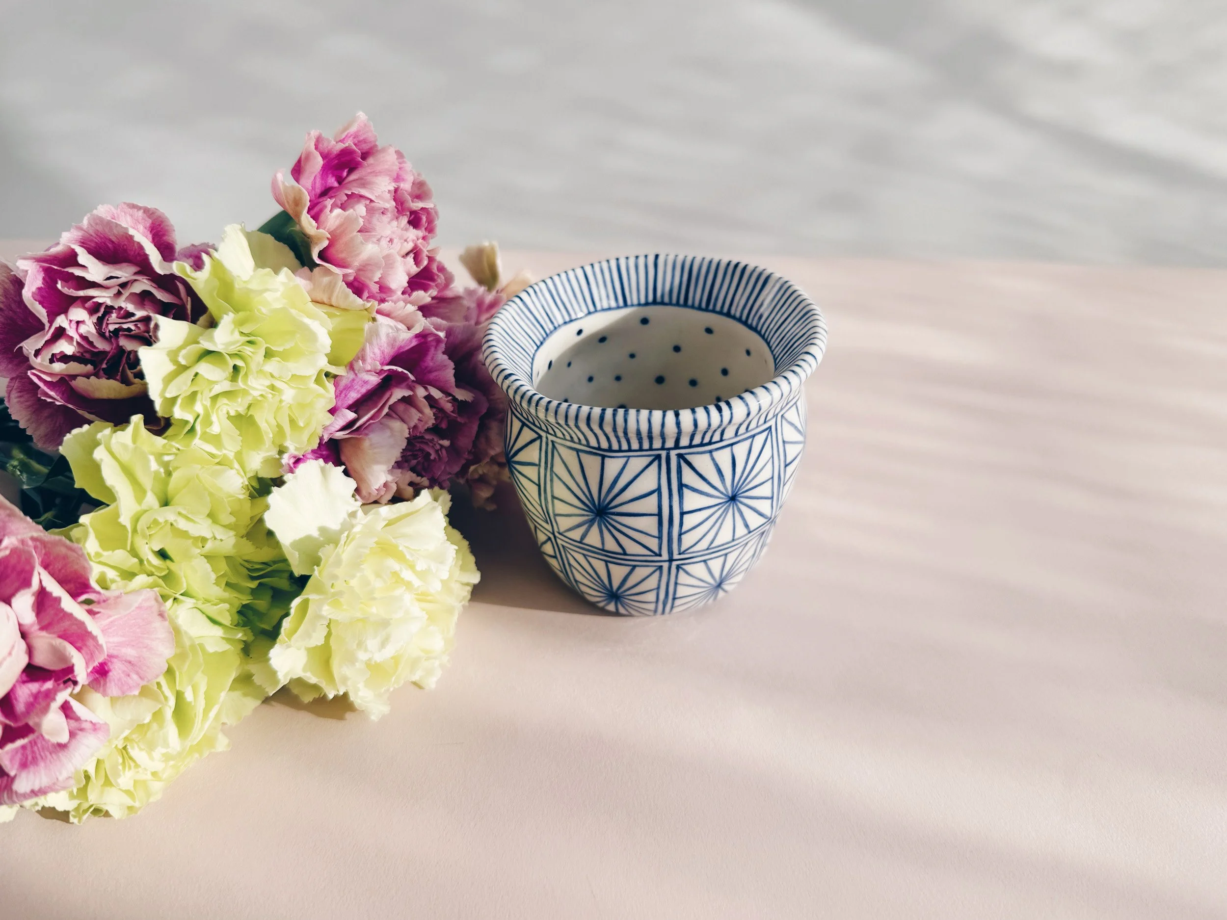 Blue and white, handmade ceramic vase.