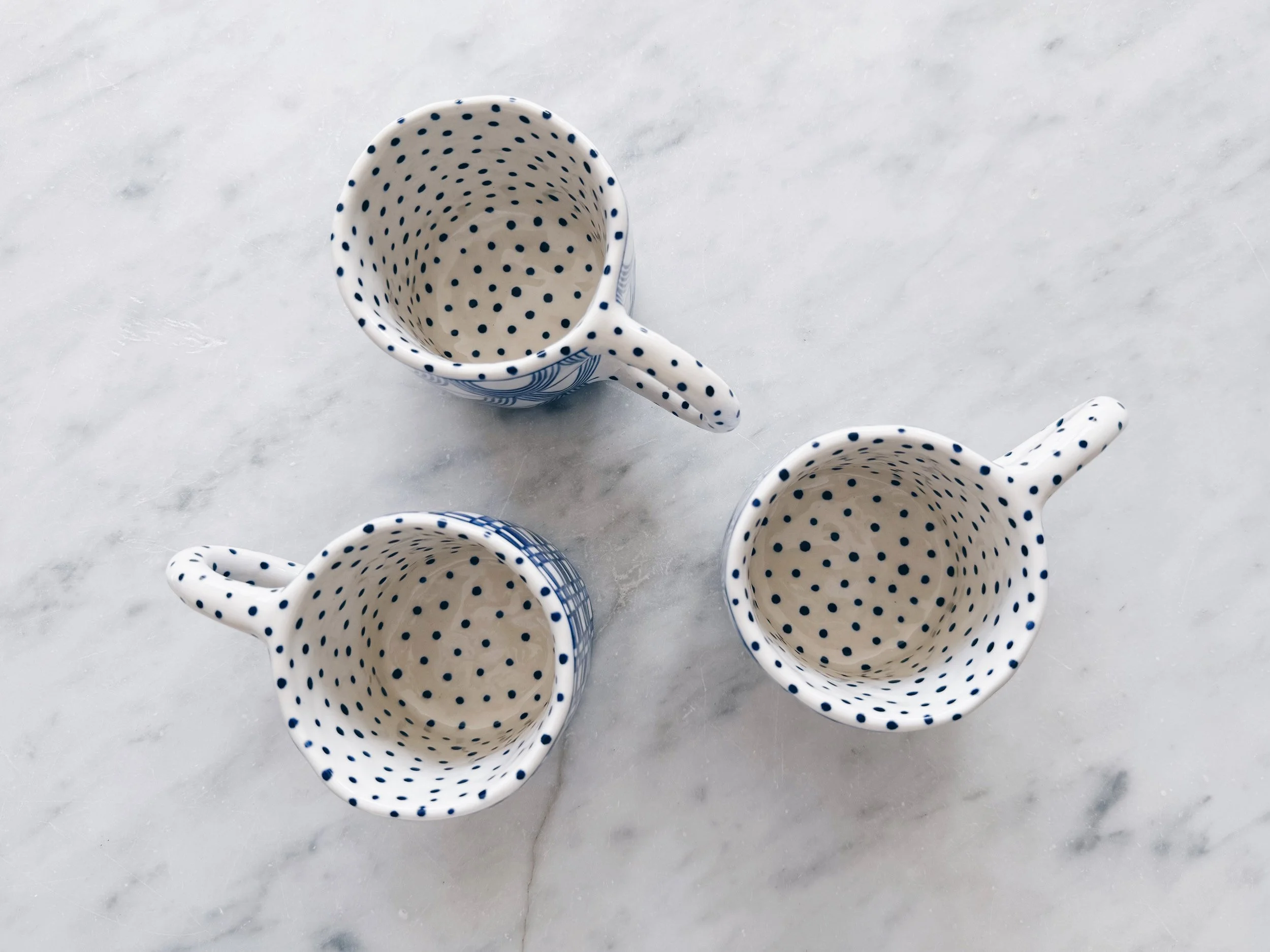 Blue and white, handmade ceramic mug.