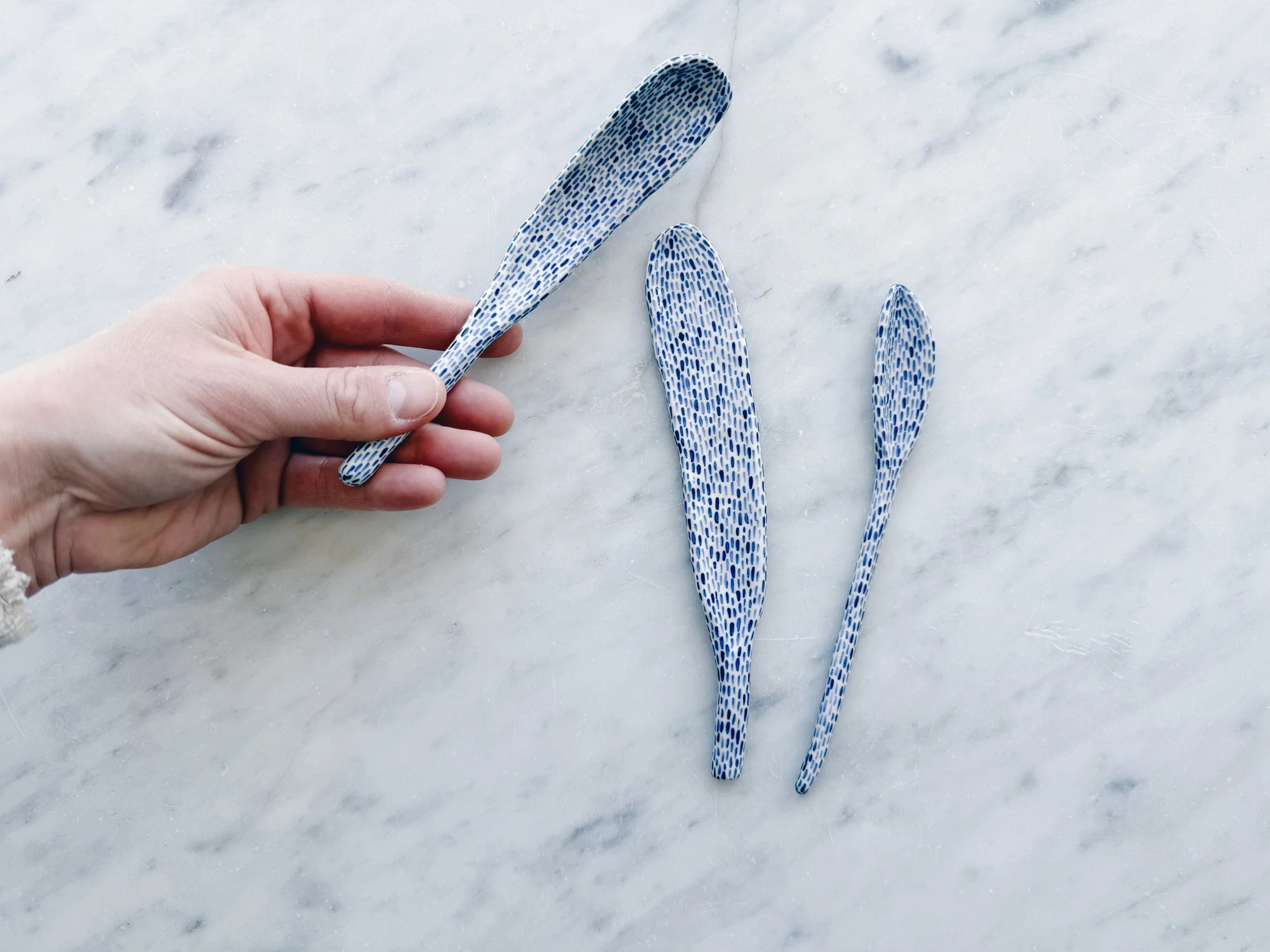 Blue and white, handmade ceramic sculpture.