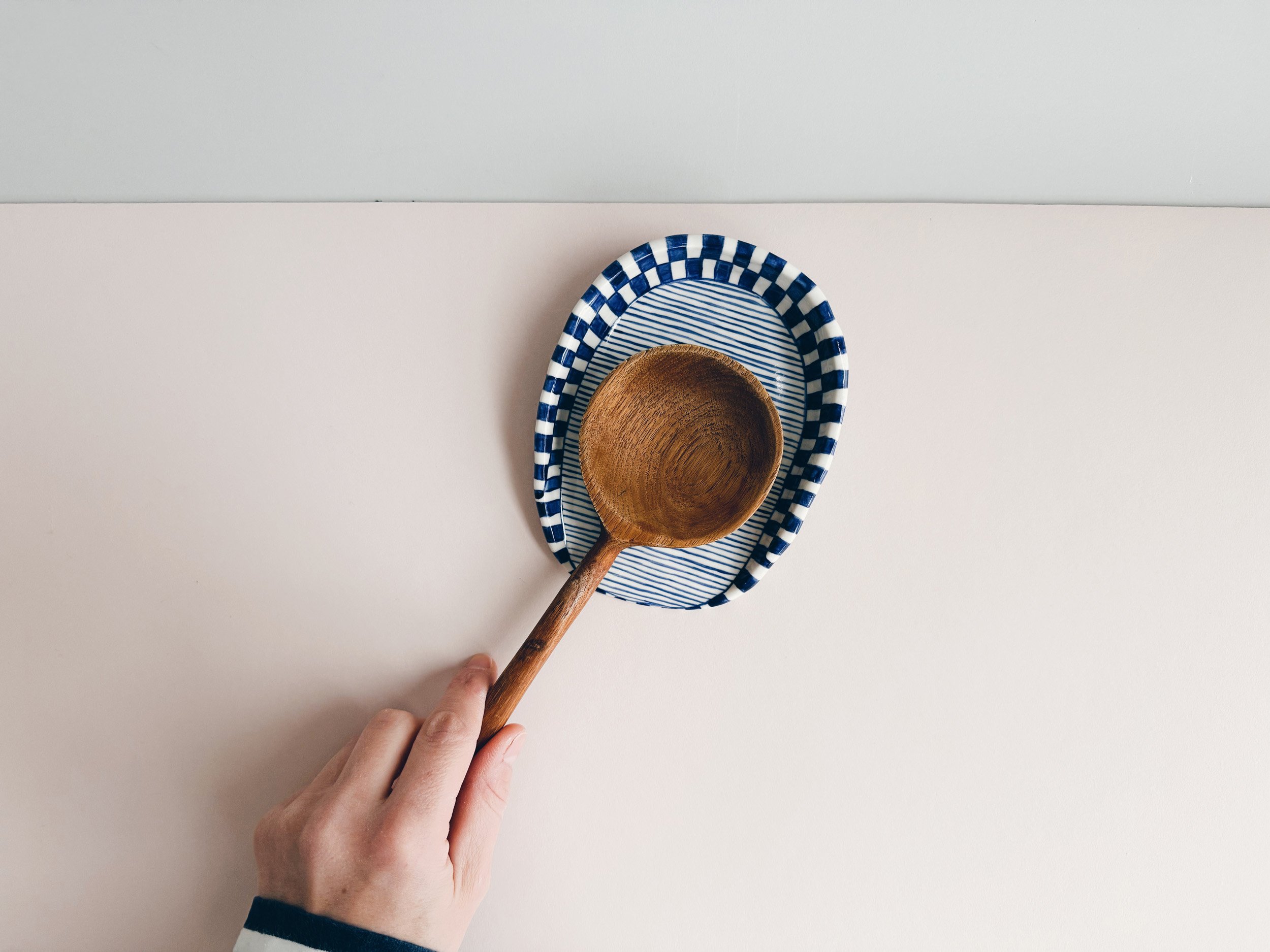Blue and white, handmade ceramic spoon rest.