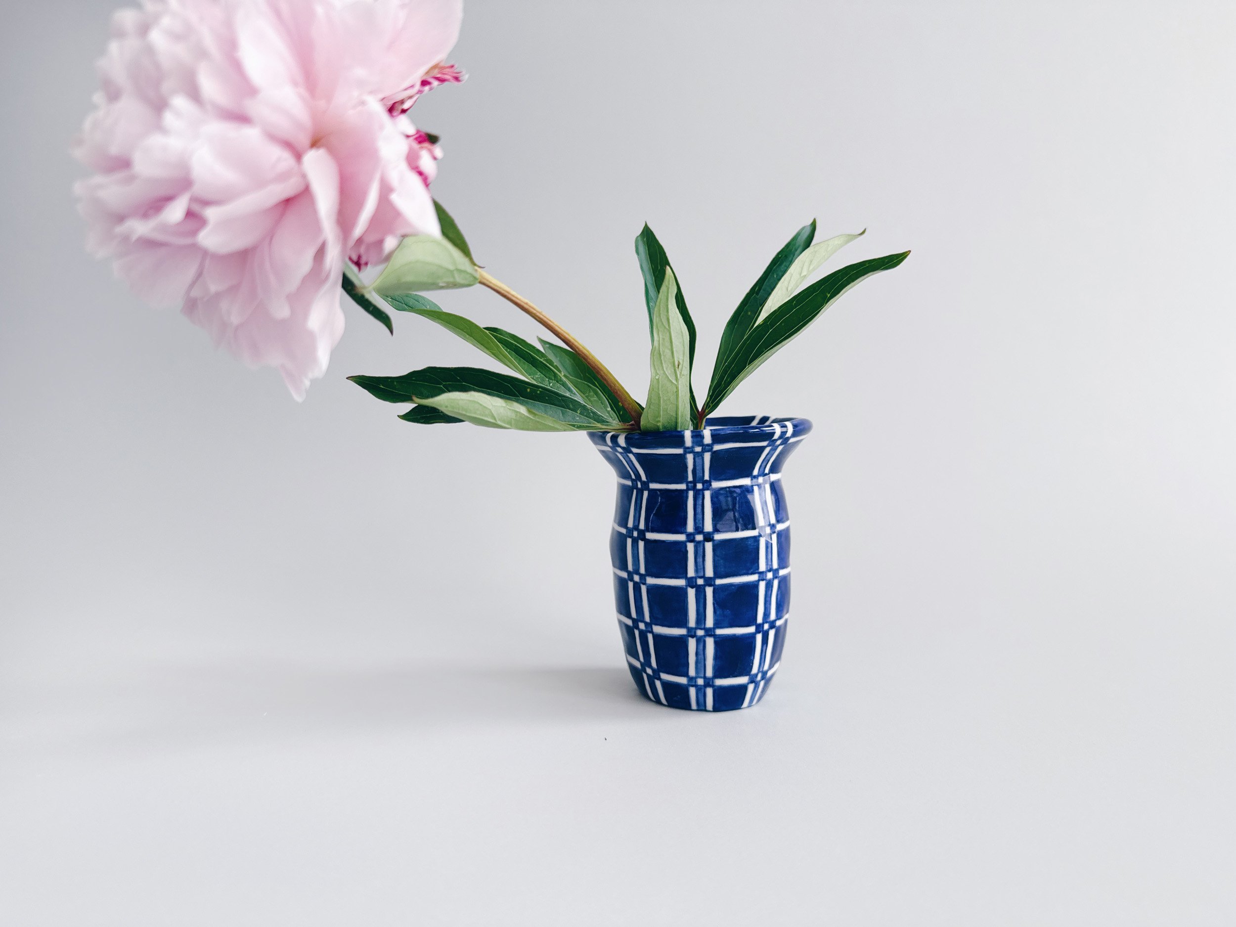 Blue and white, handmade ceramic vase.